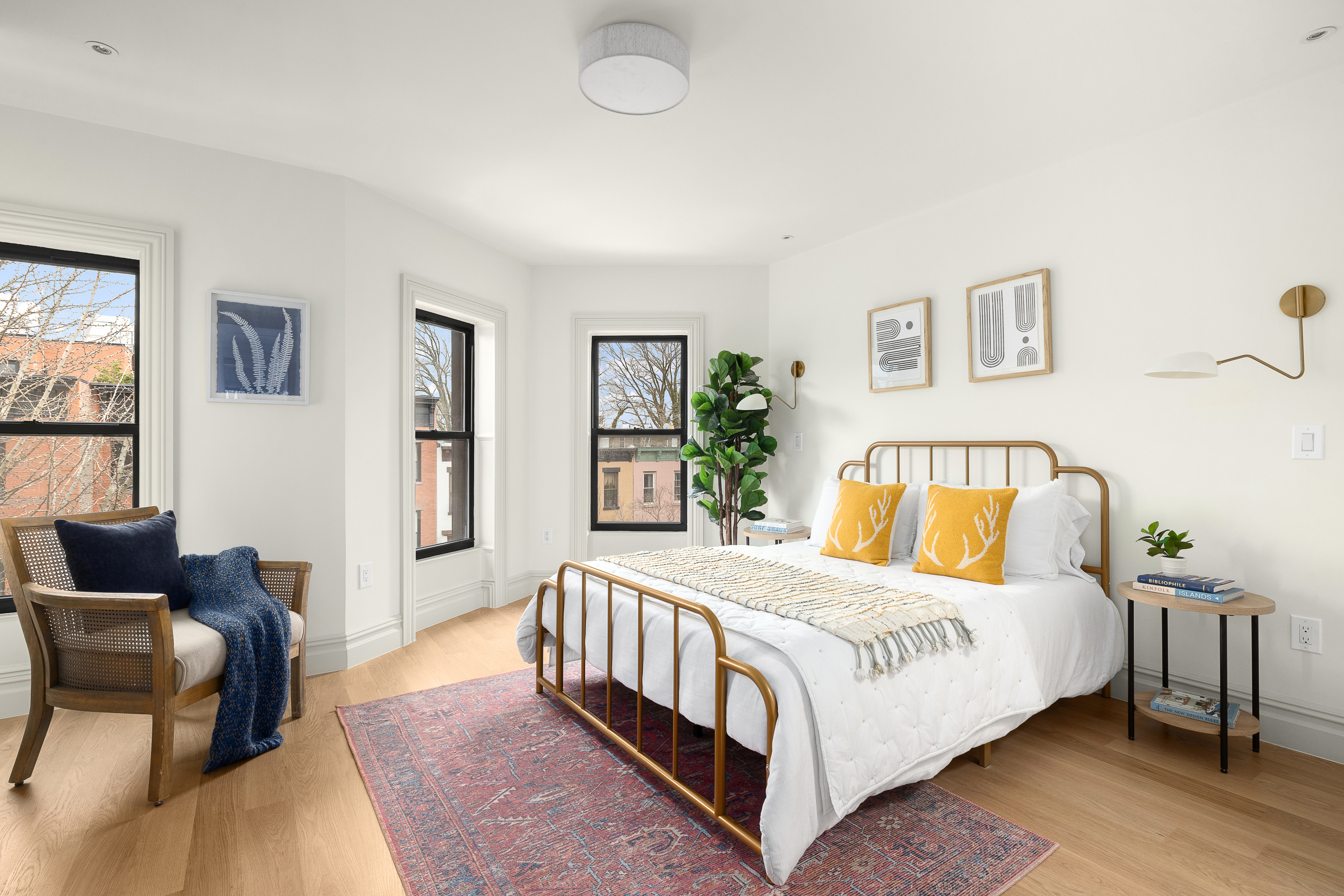 485 Halsey Street Brooklyn, NY 11233 - Photo 12 of 17 a bedroom with a bed and a couch