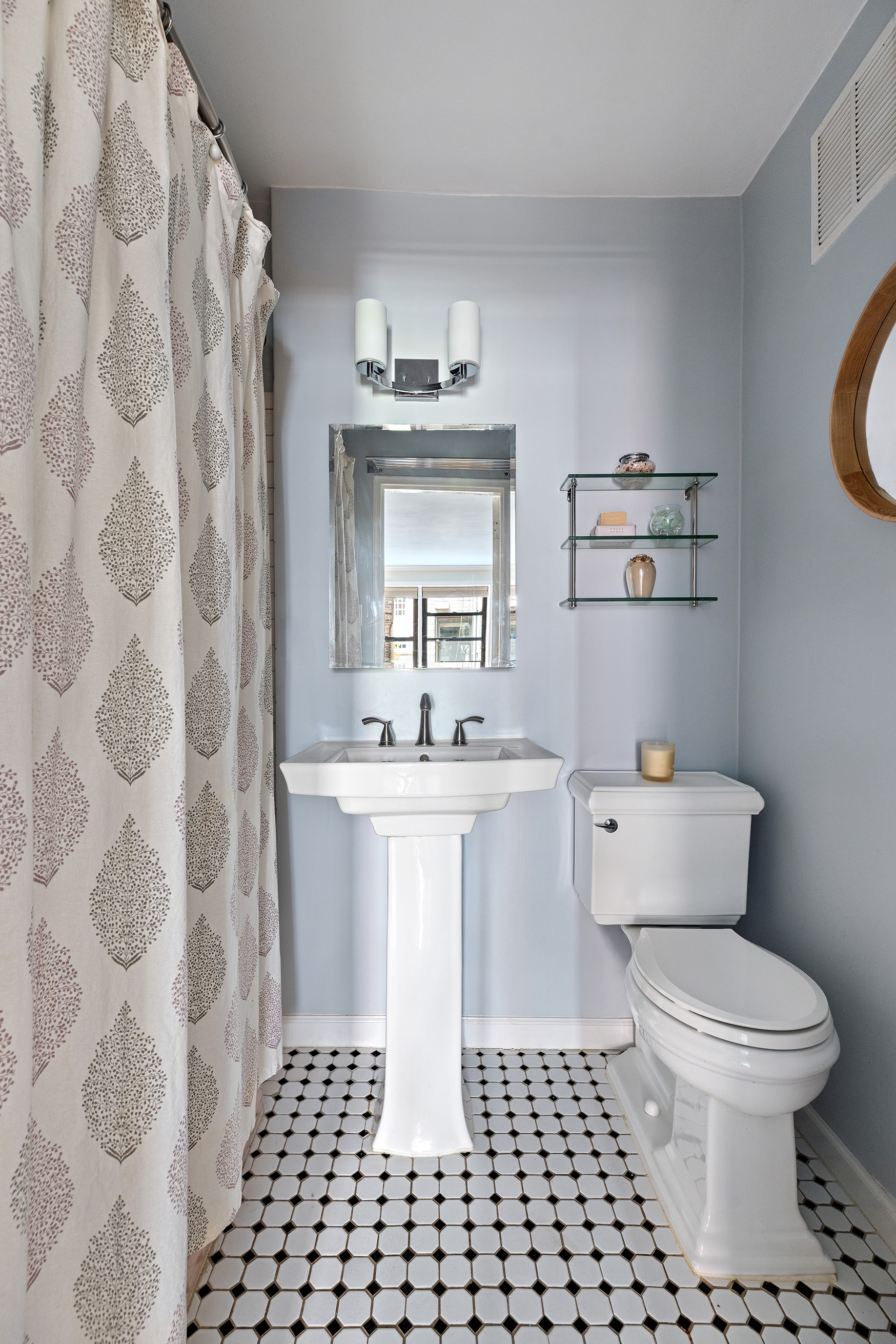 82 Irving Place, Unit 3E Manhattan, NY 10003 - Photo 5 of 15 a bathroom with a sink toilet a mirror and shower