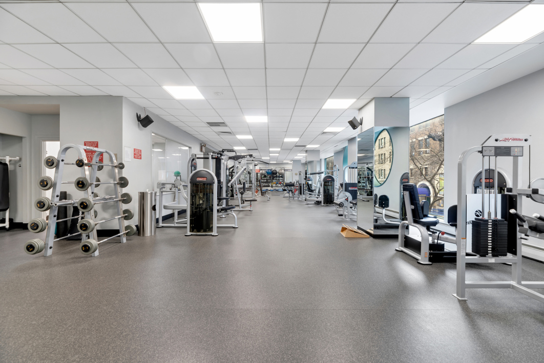 225 West 83rd Street, Unit 19A Manhattan, NY 10024 - Photo 11 of 15 a view of a room with gym equipment