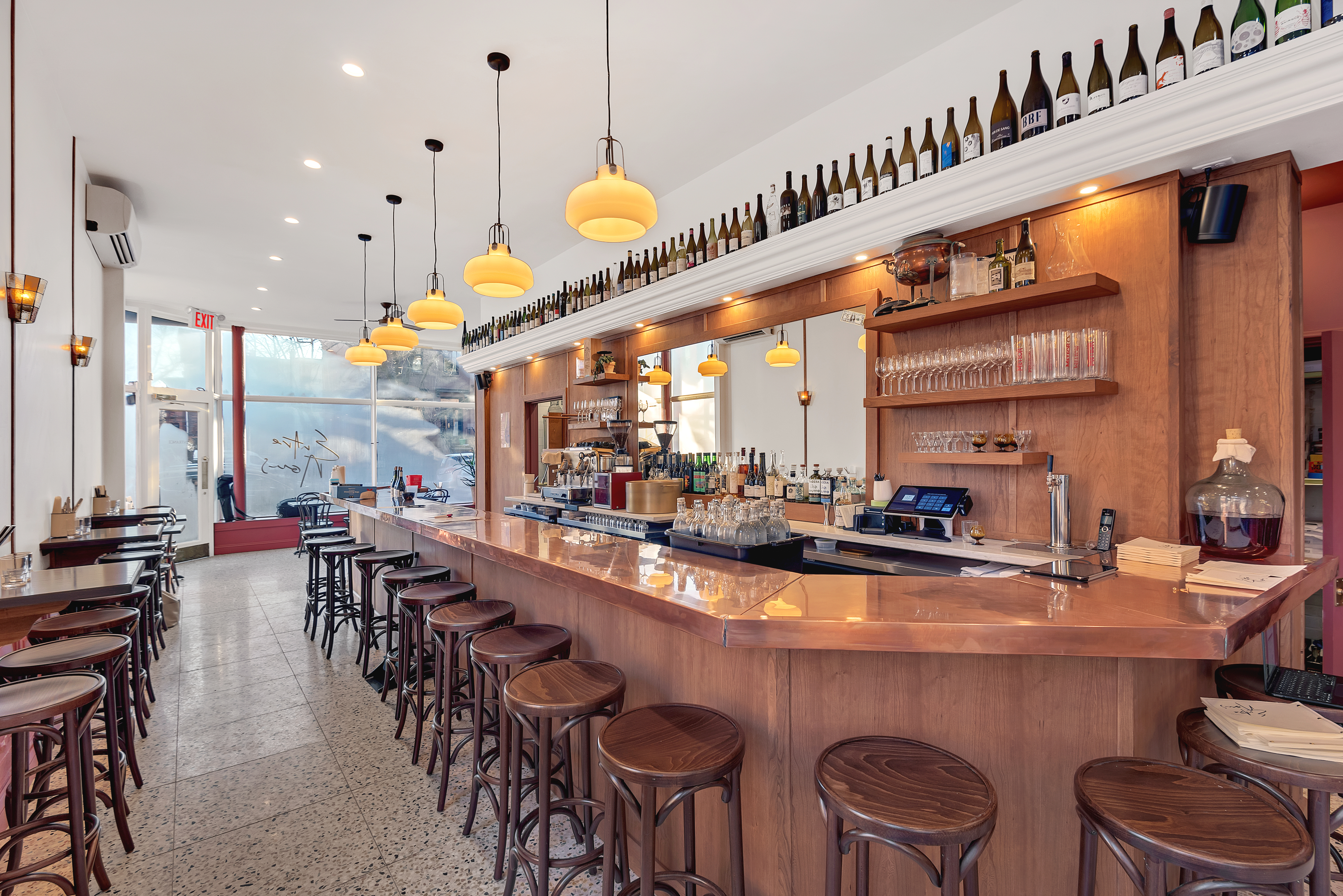 39 Clifton Place Brooklyn, NY 11238 - Photo 4 of 32 a large kitchen with a table and chairs