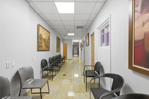 a view of a chairs in a room