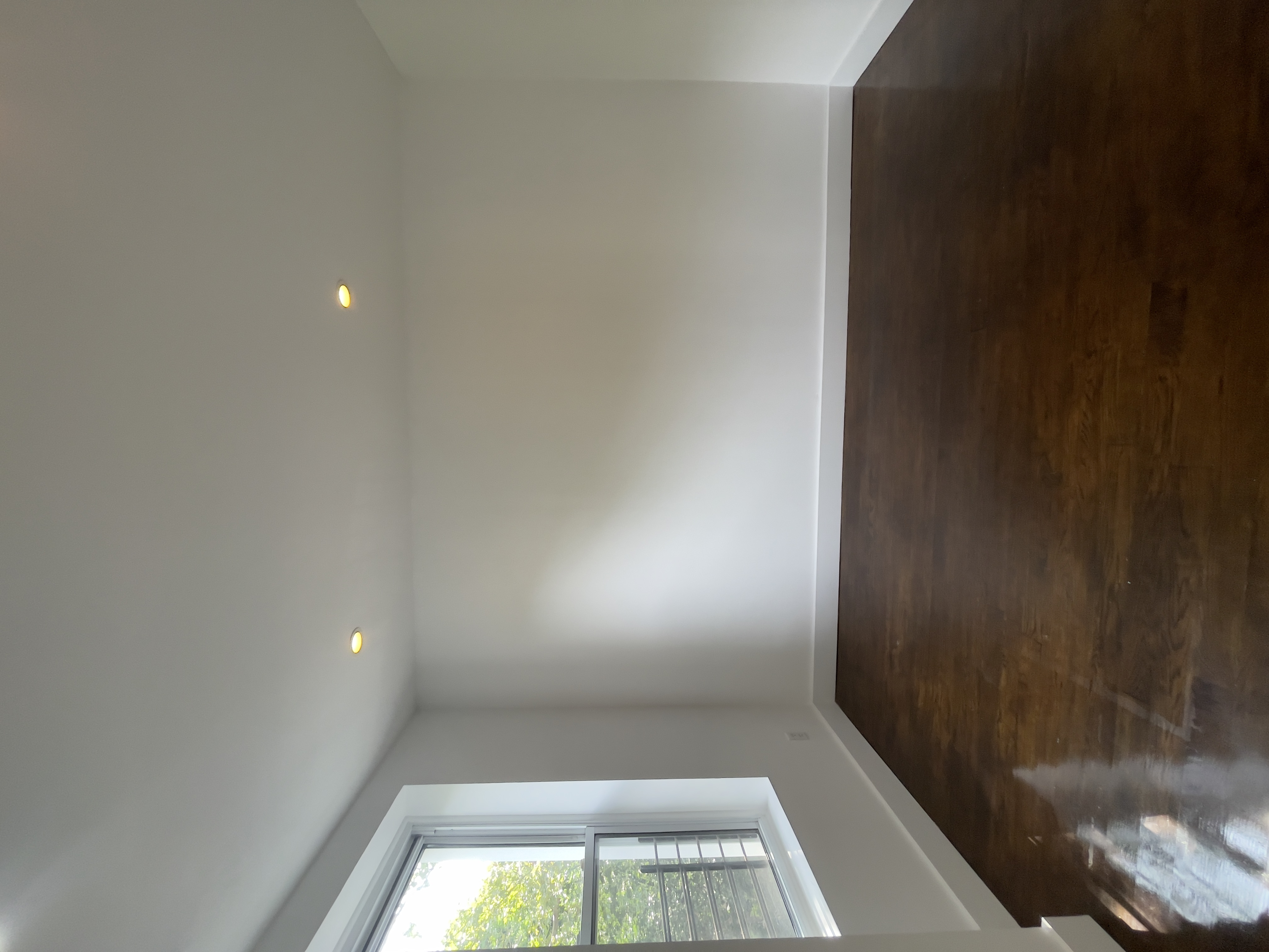 87 Douglass Street, Unit 2 Brooklyn, NY 11231 - Photo 9 of 16 an empty room with wooden floor and windows