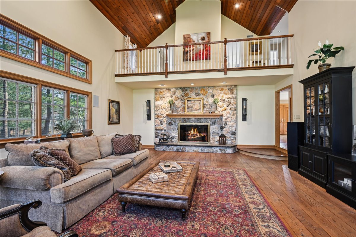 Johnston Drive Watchung, NJ 07069 - Photo 32 of 85 a living room with furniture a rug and a fireplace