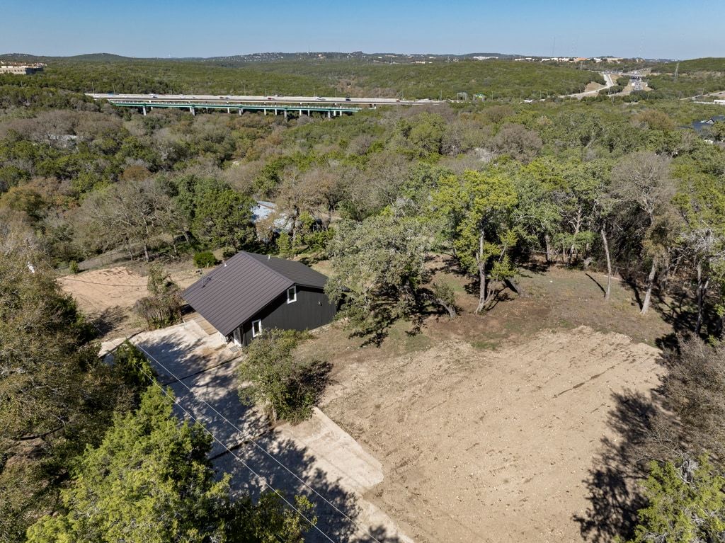 4416 Stearn's Lane Austin, TX 78735 - Photo 10 of 32 an aerial view of a house with a yard