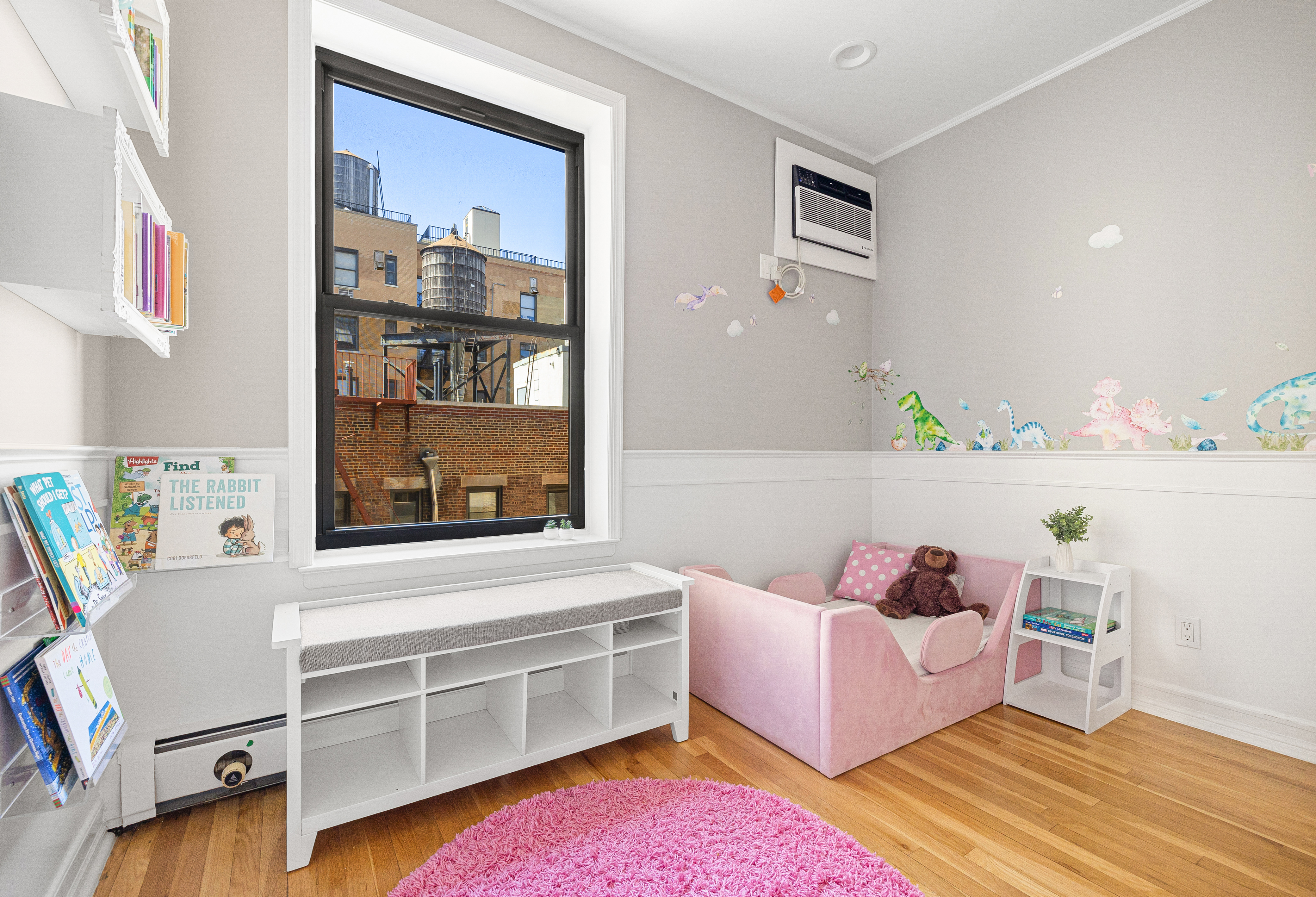 315 West 99th Street, Unit PHA Manhattan, NY 10025 - Photo 11 of 17 a living room with furniture and a window