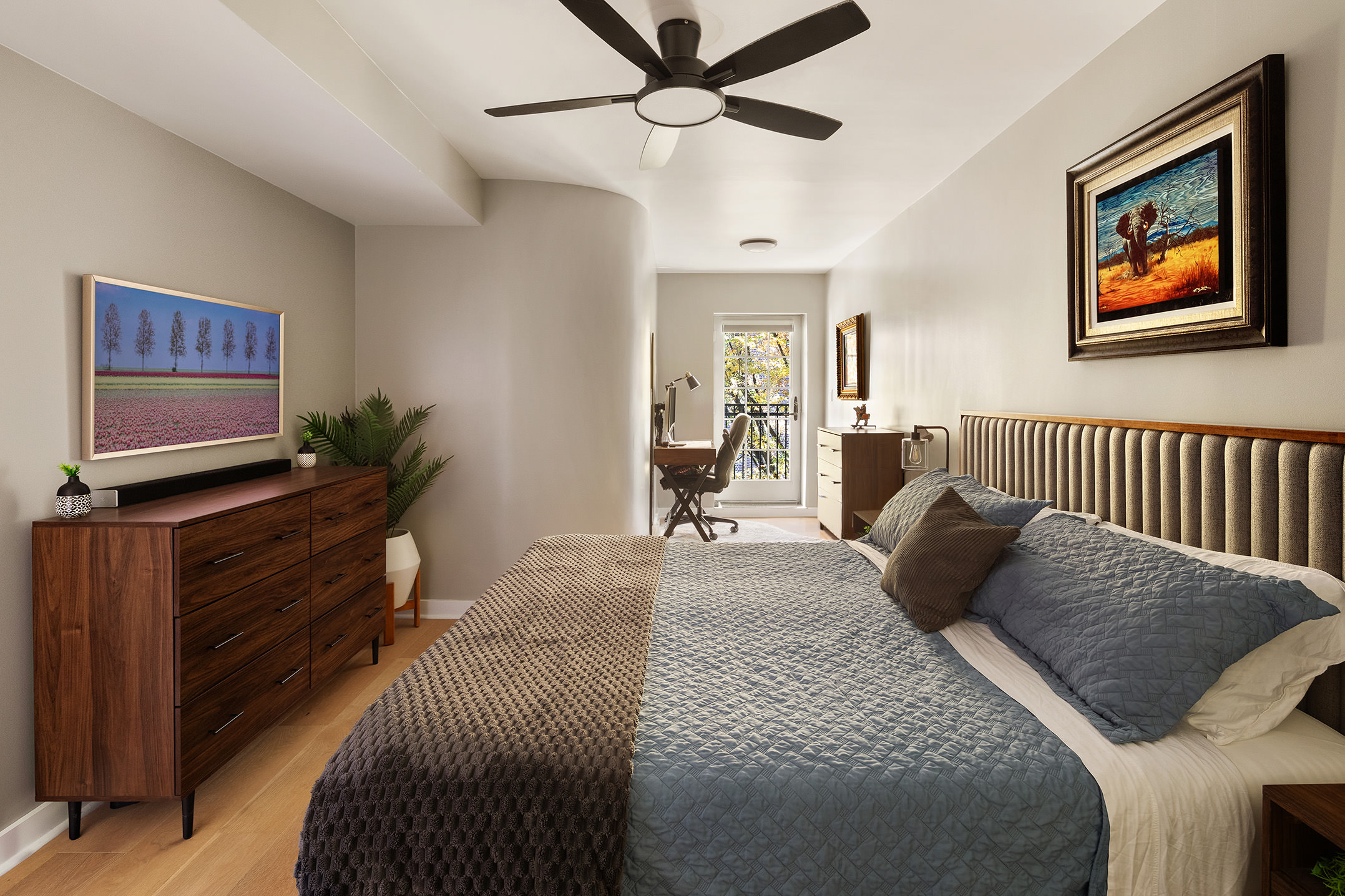 31-22 29th Street, Unit 4A Queens, NY 11106 - Photo 5 of 12 a bedroom with a bed and a chandelier