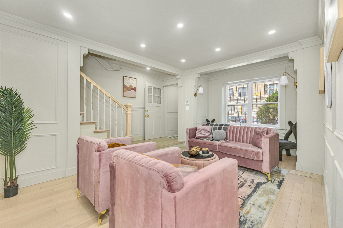 1050 Sterling Place Brooklyn, NY 11213 - Photo 3 of 23 a living room with furniture and a large window