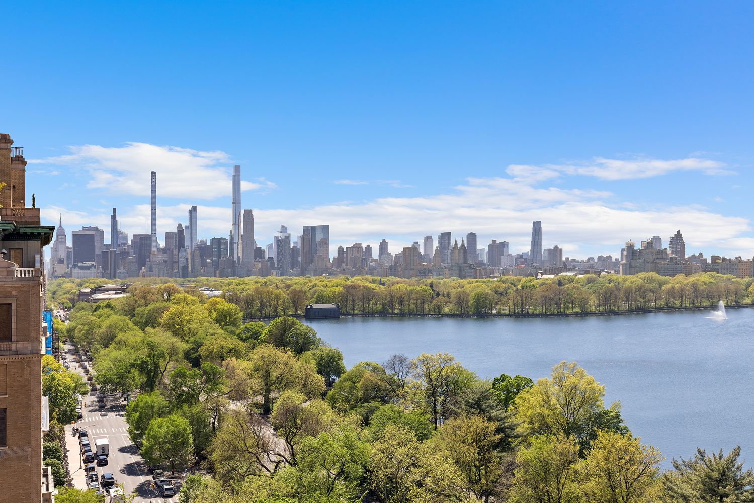 a view of a city with a lake