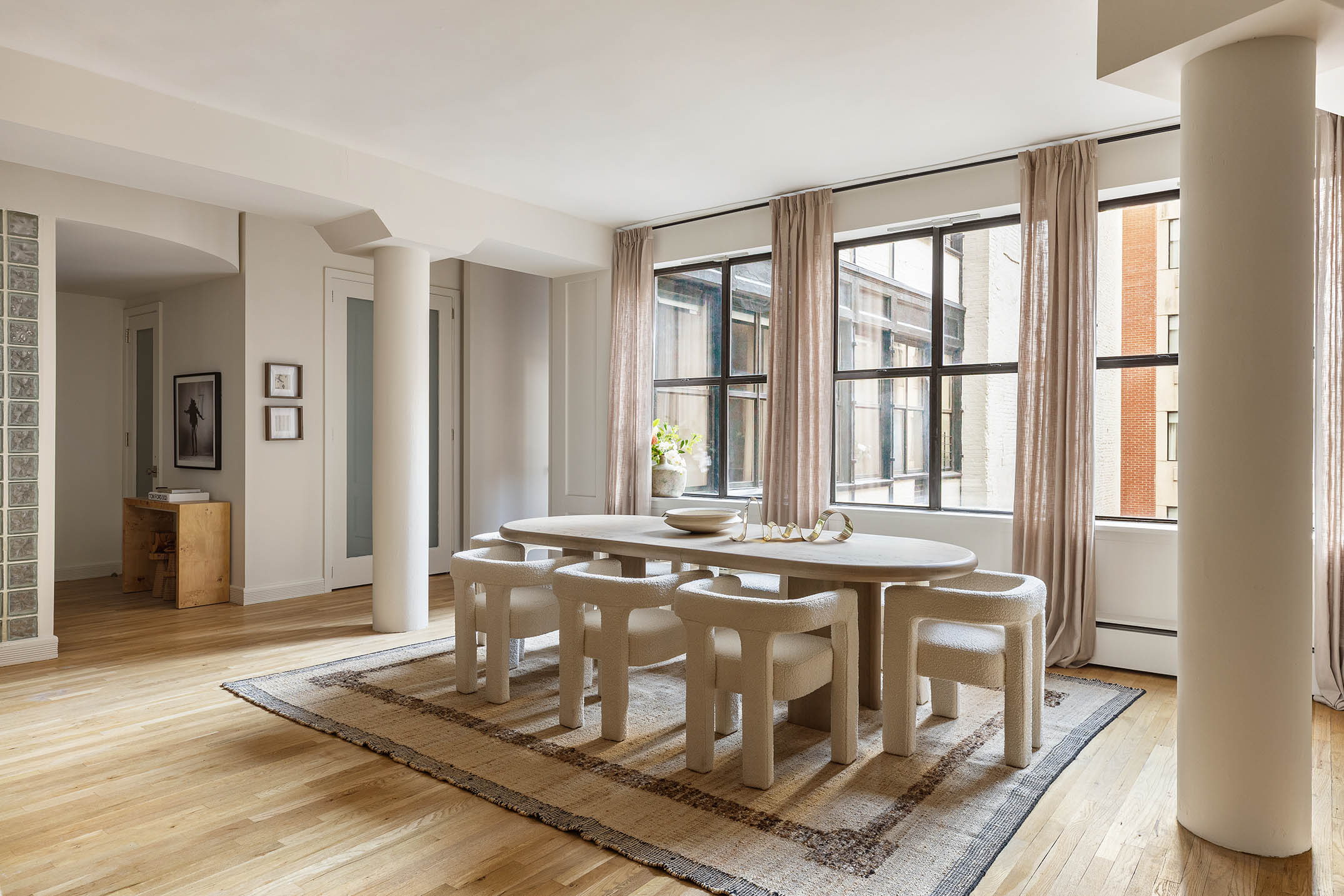 260 West Broadway, Unit 4C Manhattan, NY 10013 - Photo 4 of 28 a view of a dining table with chairs