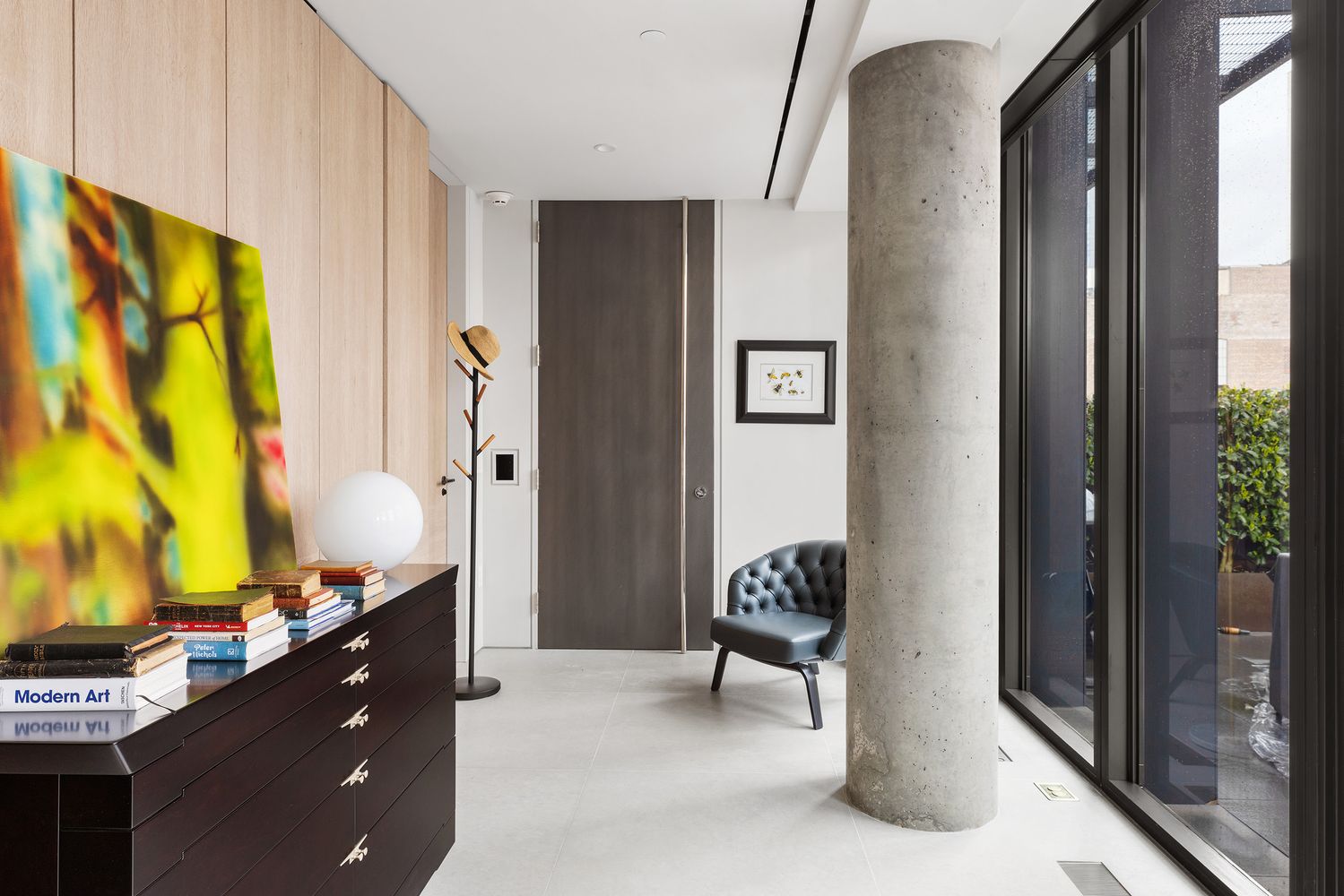 522 West 29th Street, Unit PH9C Manhattan, NY 10001 - Photo 4 of 16 a living room with furniture and a window