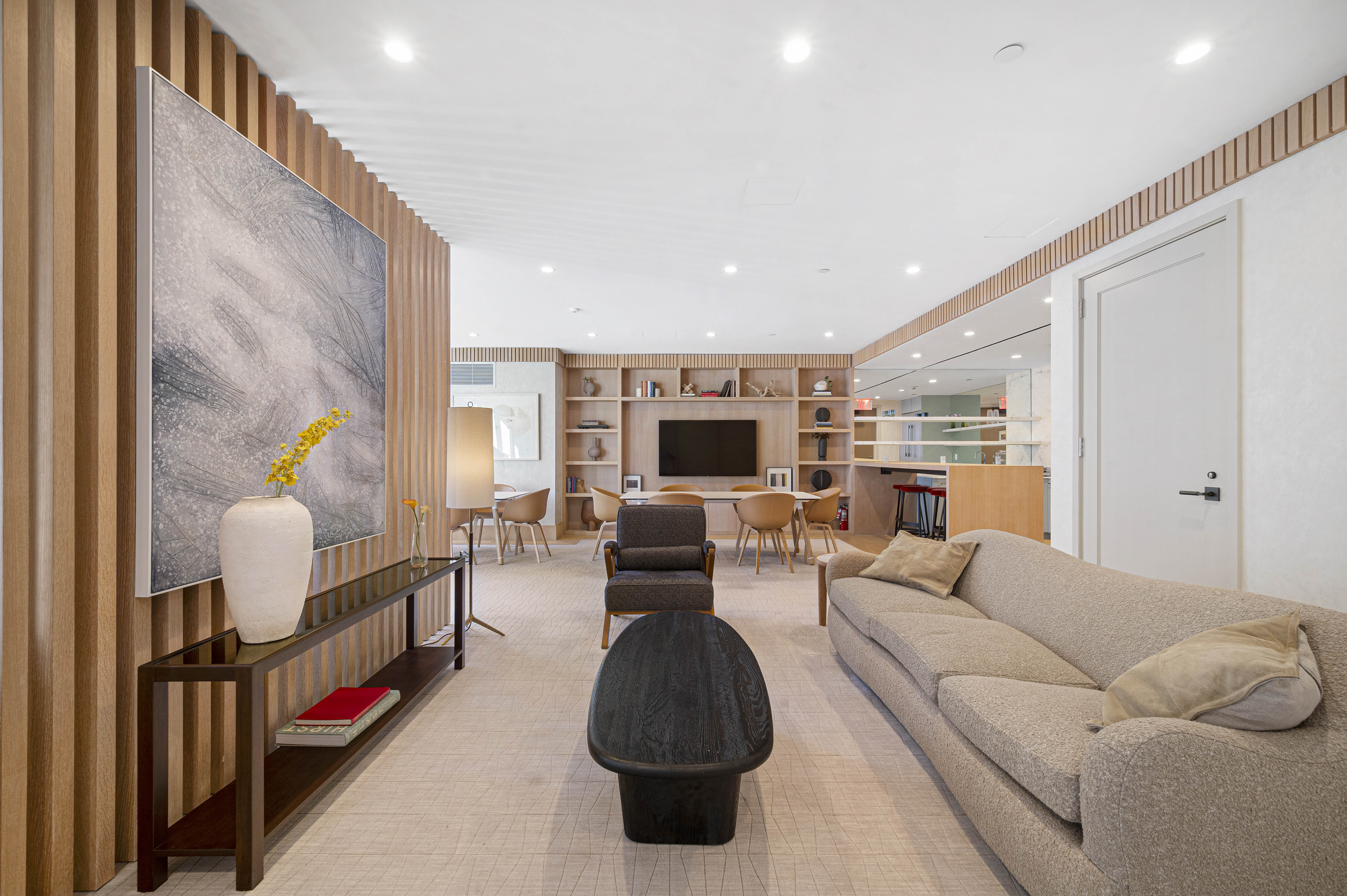 368 3rd Avenue, Unit 11A Manhattan, NY 10016 - Photo 15 of 17 a living room with furniture and a flat screen tv