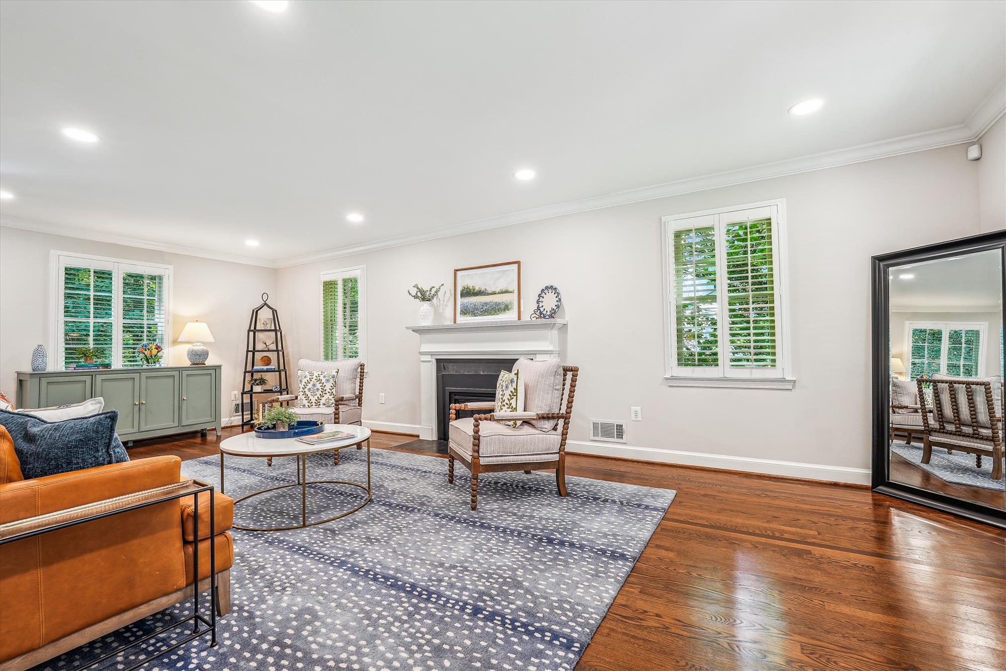 9904 Carter Road Bethesda, MD 20817 - Photo 4 of 41 a living room with furniture and a fireplace