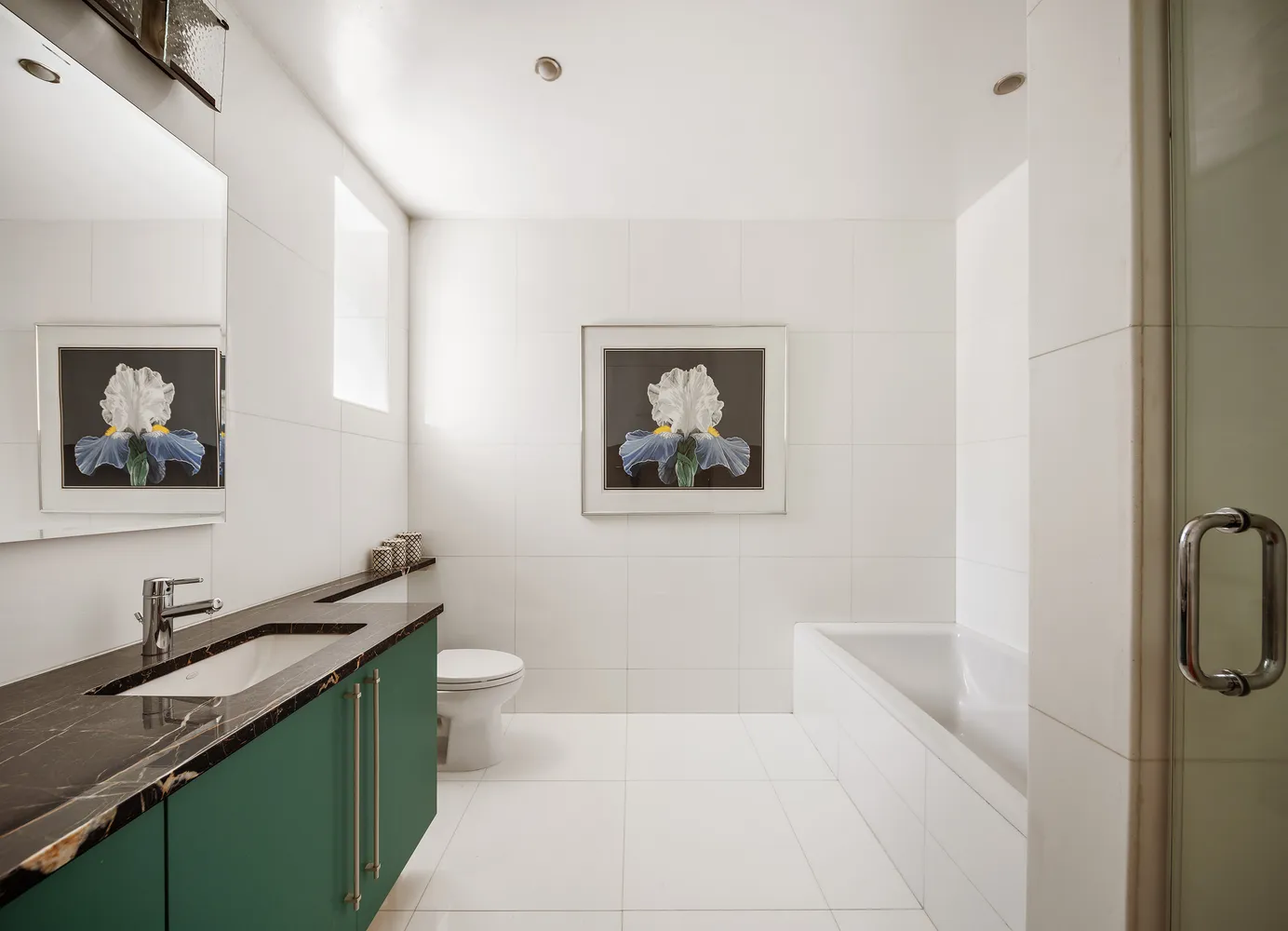 a bed room with a bed and a chandelier