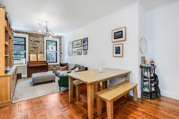 a view of a livingroom with furniture and a couch