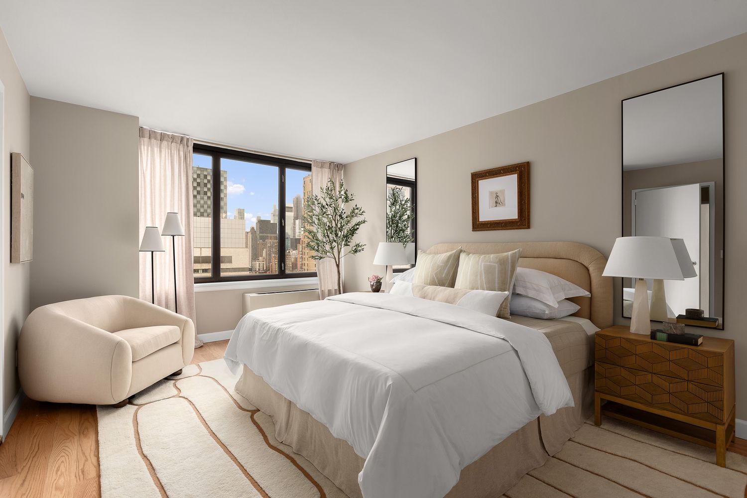 a bedroom with a bed and a mirror