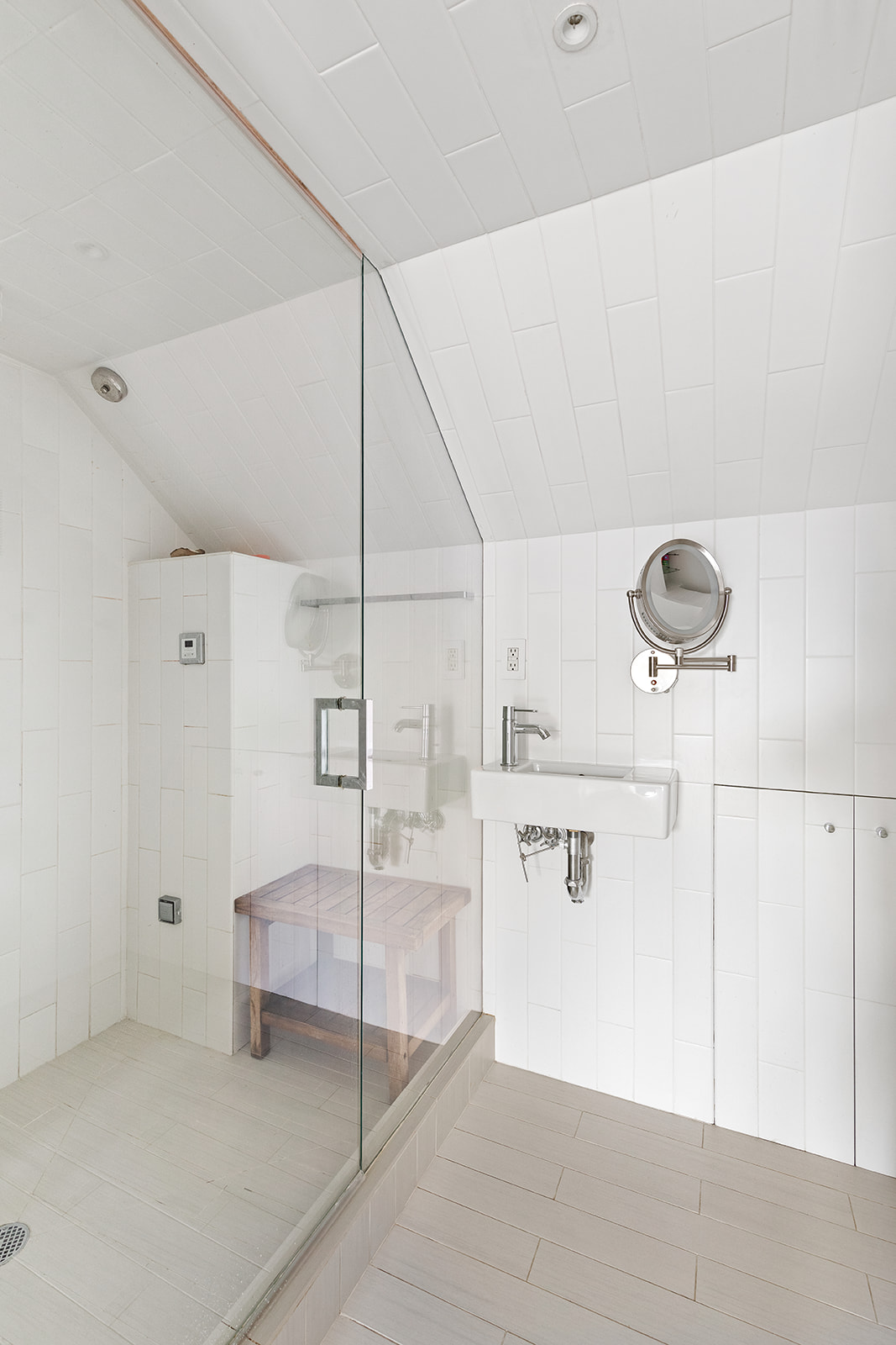 357 West 12th Street, Unit 5E Manhattan, NY 10014 - Photo 11 of 13 a bathroom with a sink and a mirror
