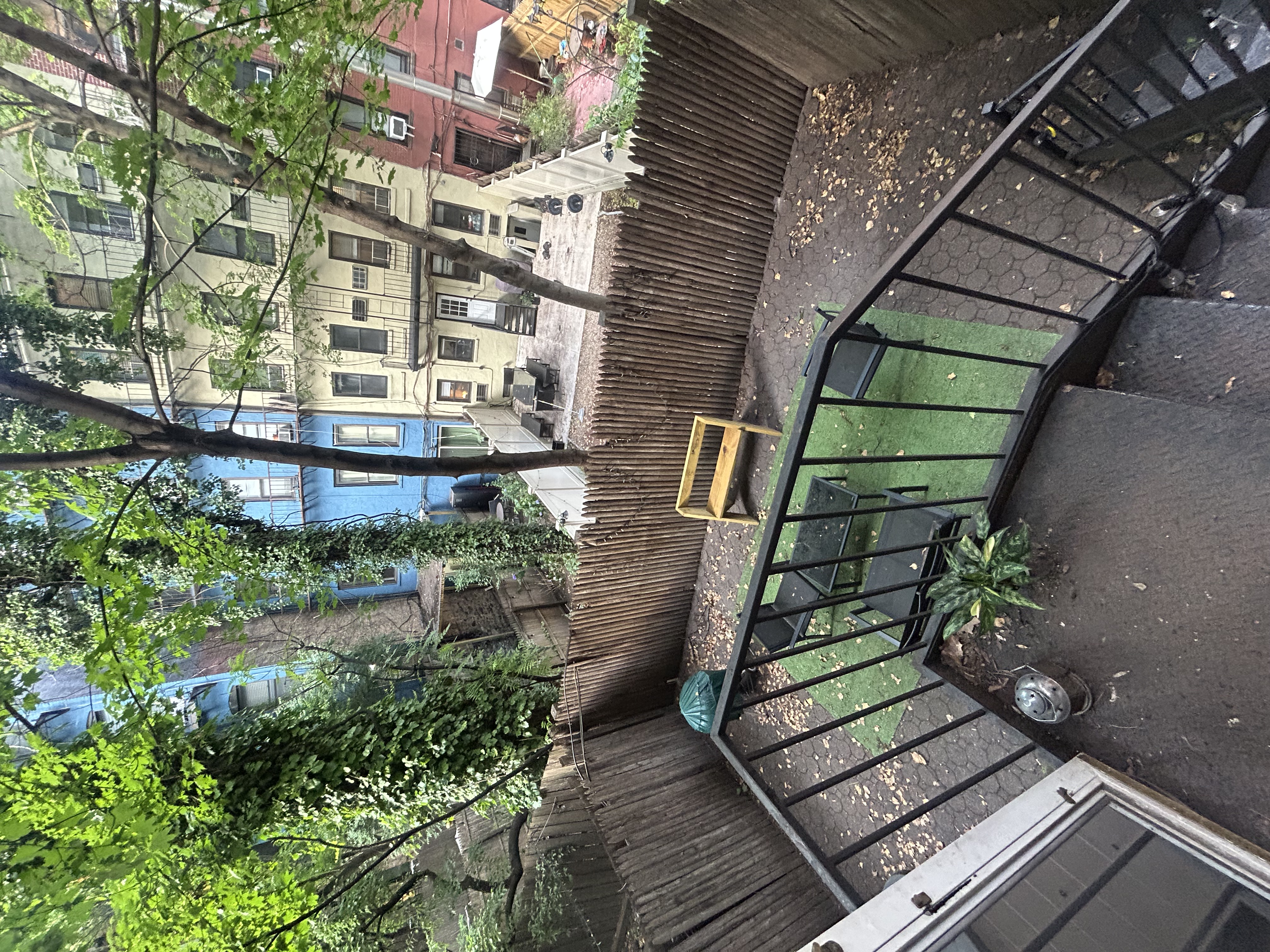 317 East 73rd Street, Unit 1RE Manhattan, NY 10021 - Photo 9 of 9 a view of outdoor space with seating and trees