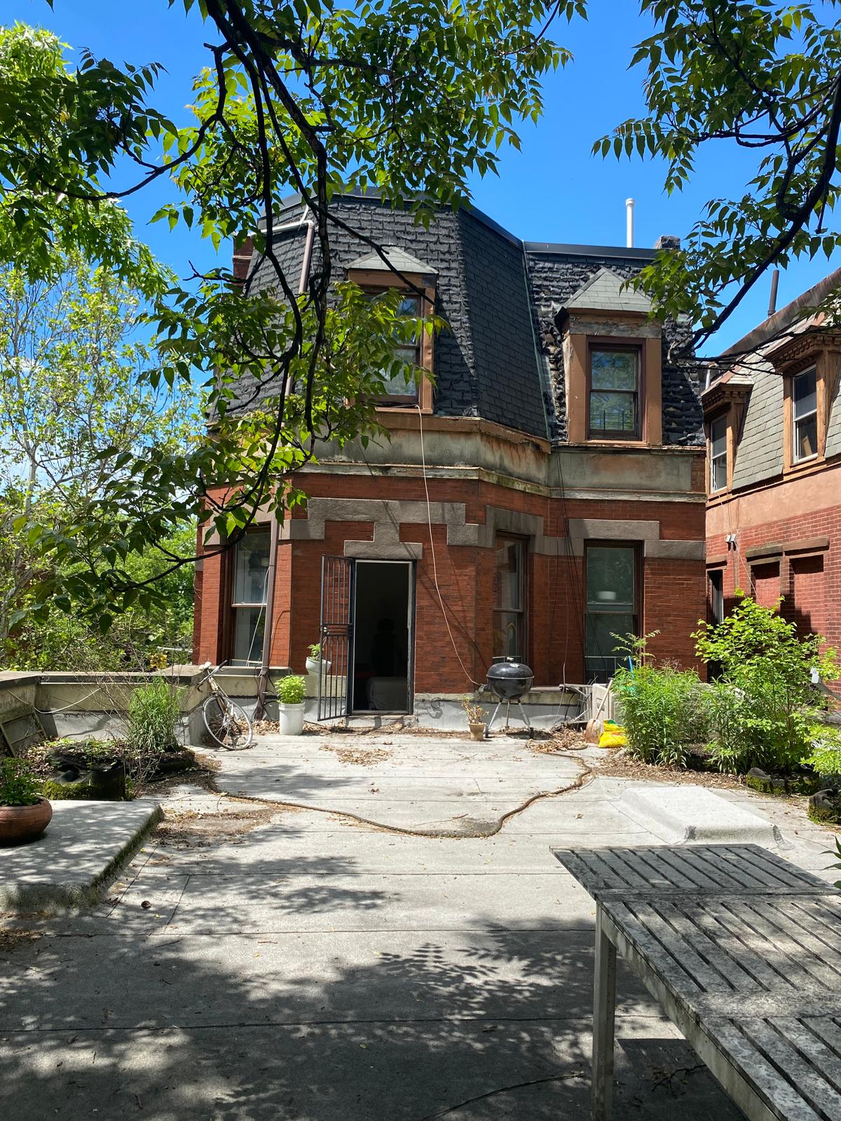 a house with trees in front of it