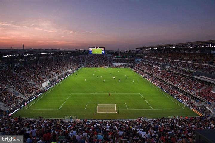 1101 3rd Street Southwest, Unit 206 Washington, DC 20024 - Photo 20 of 21 a green field with lots of green space