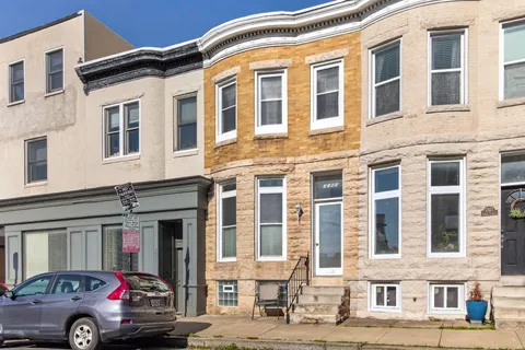 a car parked in front of a building