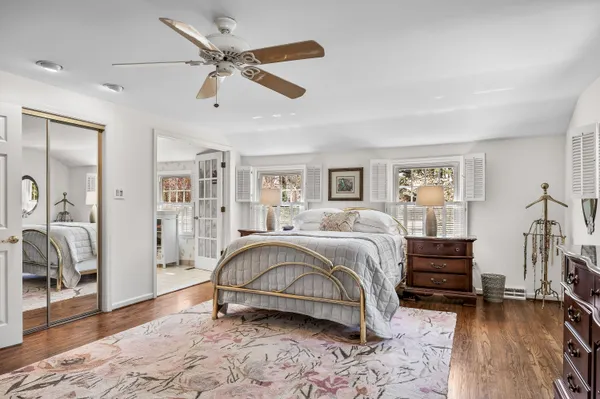 a view of balcony with furniture and wooden floor