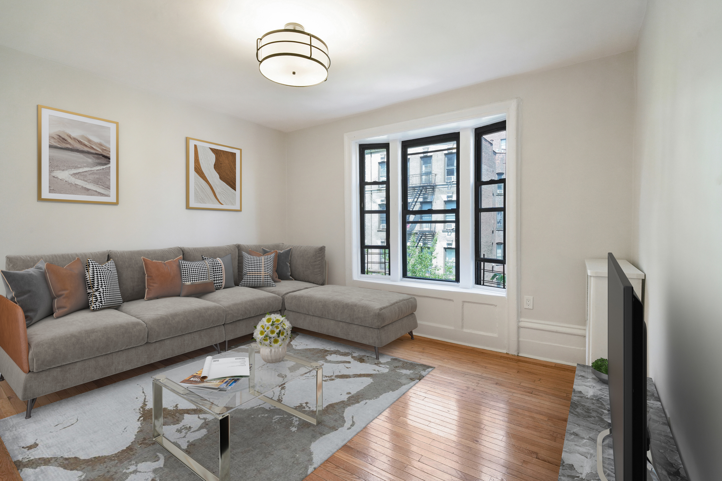 a living room with furniture and a window
