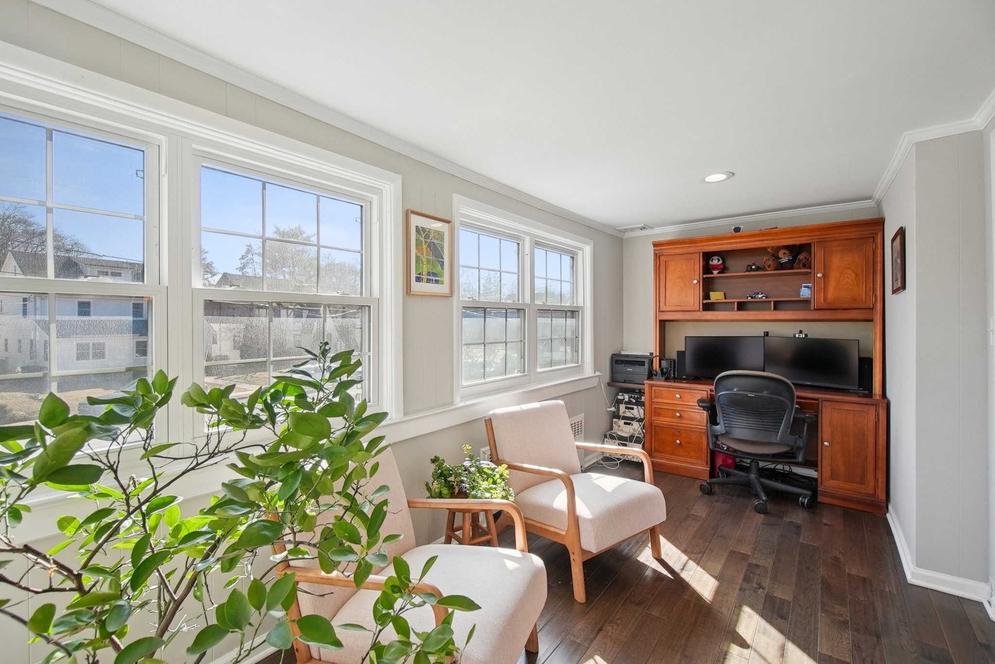 877 Ridgewood Road Millburn, NJ 07041 - Photo 13 of 37 a living room with furniture and a potted plant