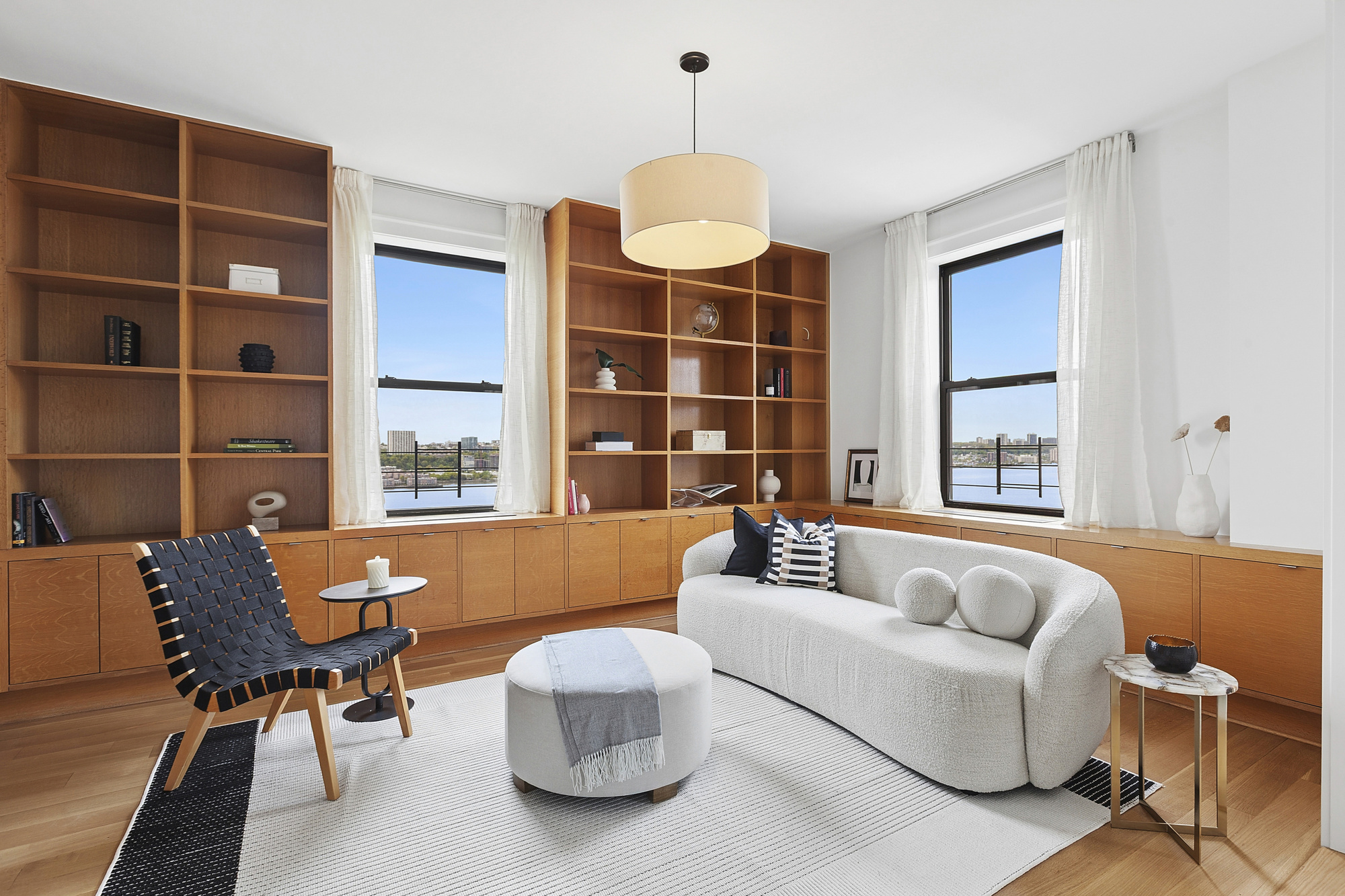 325 Riverside Drive, Unit 111 Manhattan, NY 10025 - Photo 3 of 13 a living room with furniture and a window