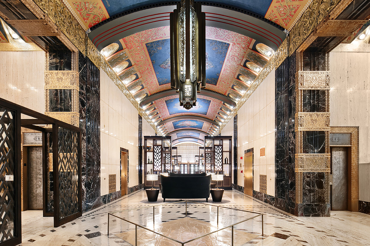 100 Barclay Street, Unit 21AD Manhattan, NY 10007 - Photo 32 of 40 a front view of a building with glass windows