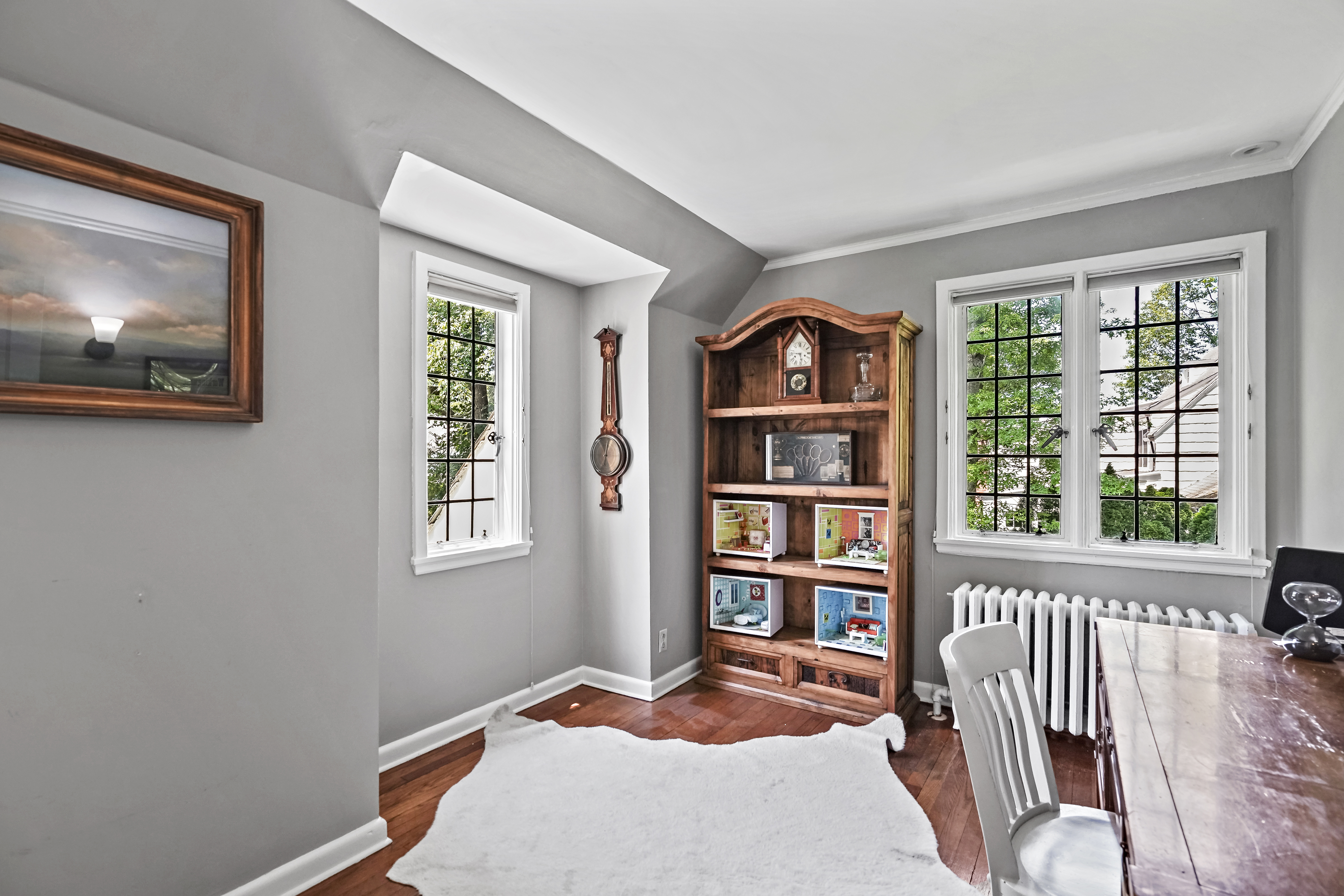 19 Avon Road Larchmont, NY 10538 - Photo 17 of 35 a bedroom with furniture and a window