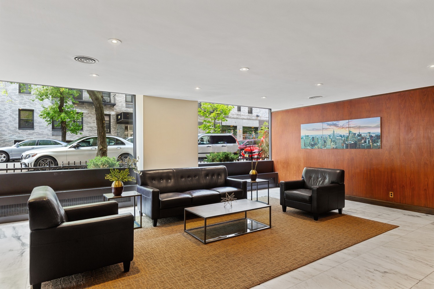 201 East 28th Street, Unit 21BC Manhattan, NY 10016 - Photo 22 of 24 a living room with furniture and a couch