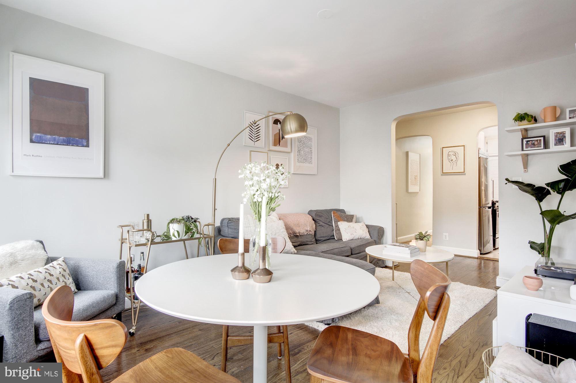 731 13th Street Northeast Washington, DC 20002 - Photo 8 of 43 a dining room with furniture and wooden floor