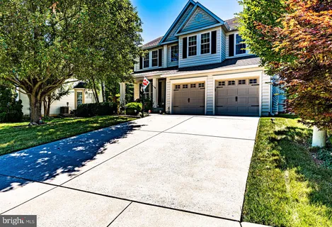 a front view of house with yard