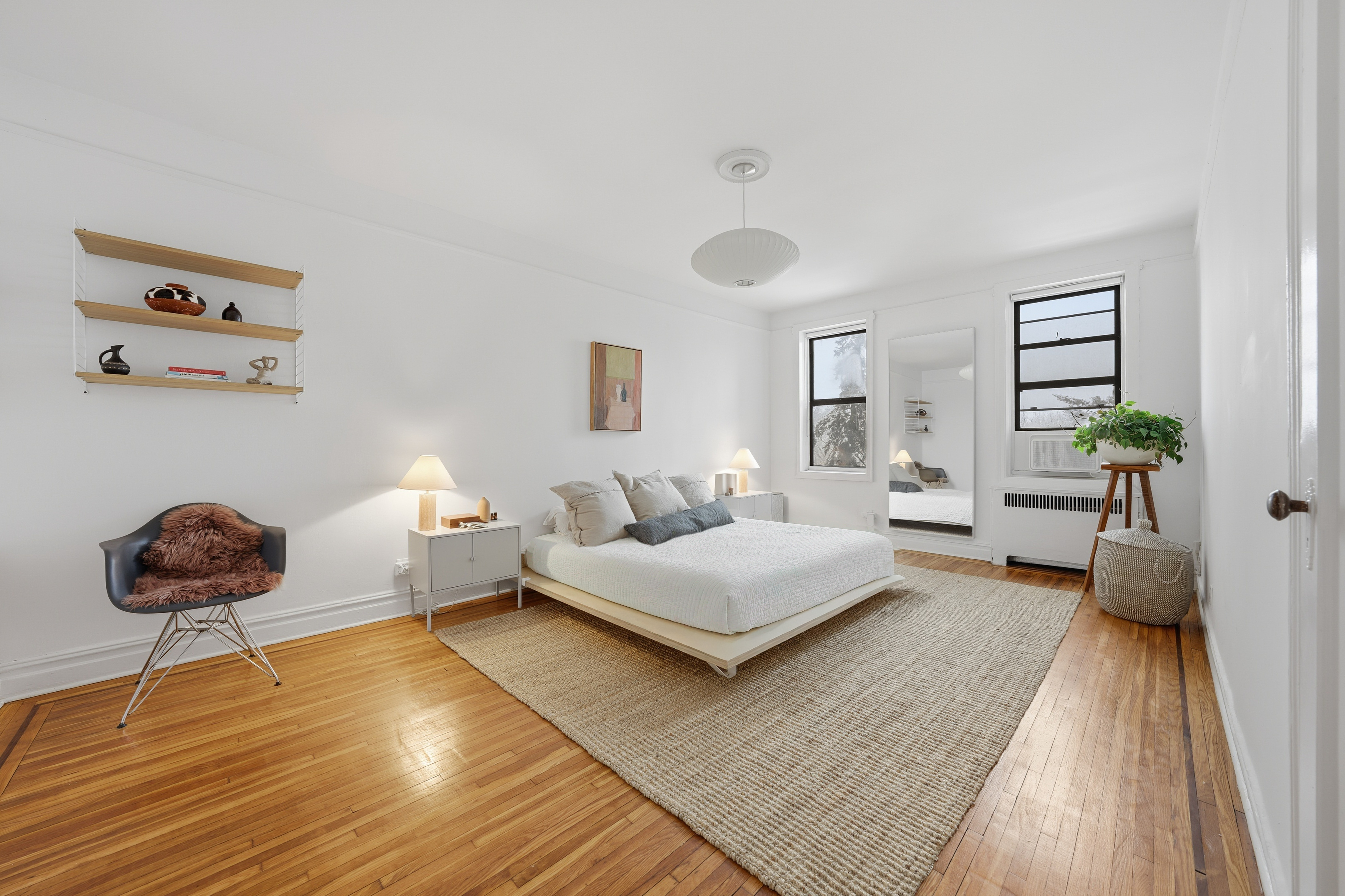 80 Avenue P, Unit D14 Brooklyn, NY 11204 - Photo 13 of 19 a living room with furniture and a rug