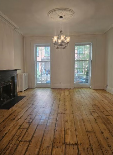 138 State Street Brooklyn, NY 11201 - Photo 3 of 13 a view of livingroom with hardwood floor and kitchen