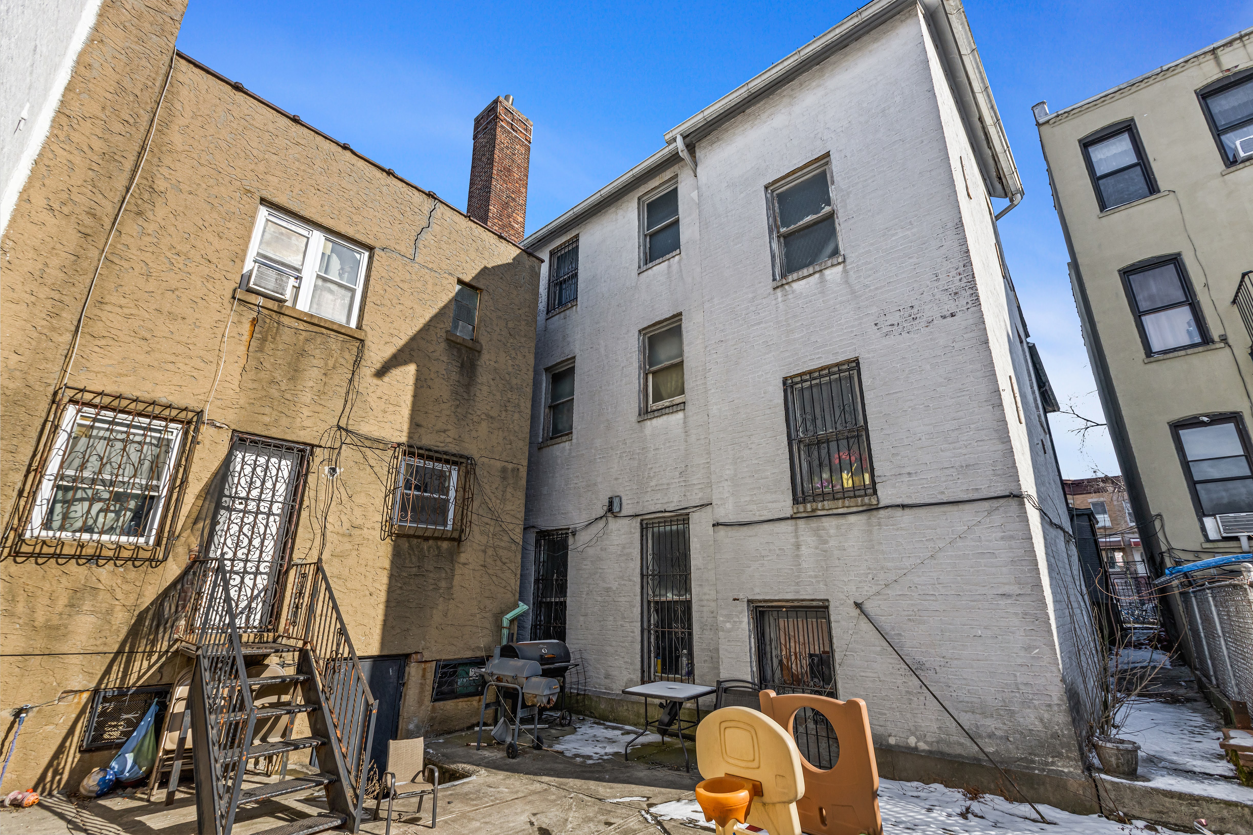 4802 6th Avenue Brooklyn, NY 11220 - Photo 9 of 21 a front view of a building with many windows