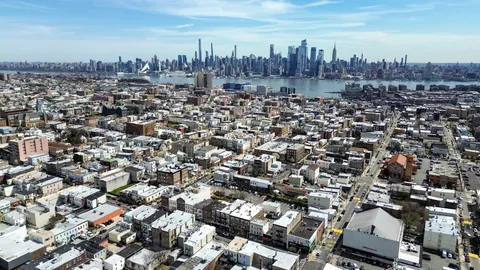 an aerial view of a city with lots of residential buildings