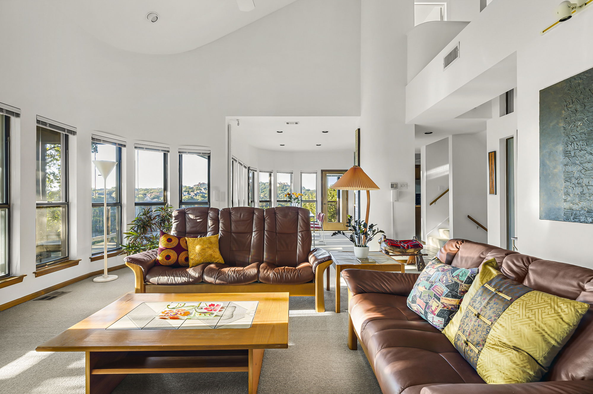 1605 The High Road Austin, TX 78746 - Photo 7 of 45 a living room with furniture and a large window