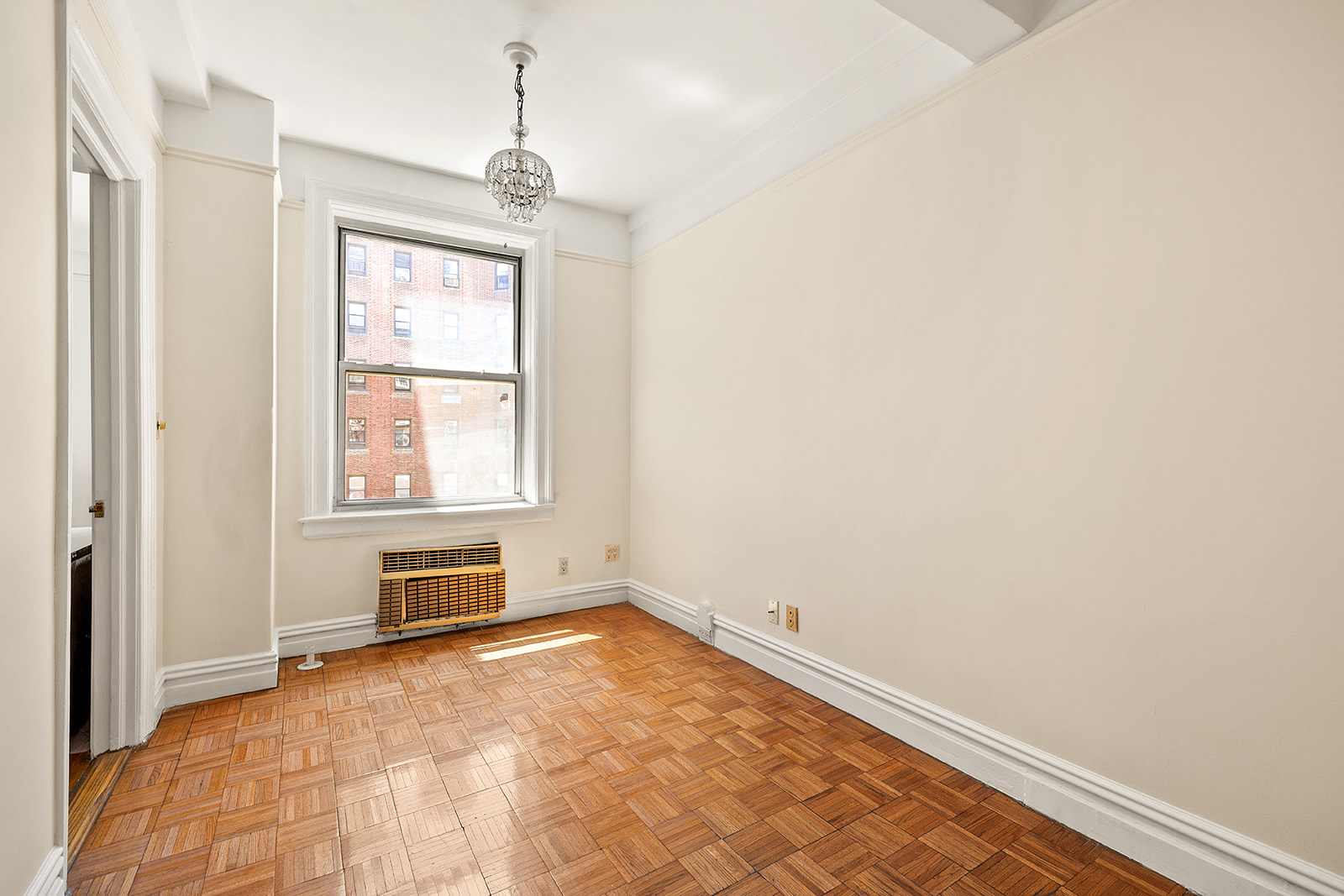 345 West 55th Street, Unit 8AB Manhattan, NY 10019 - Photo 12 of 14 an empty room with windows