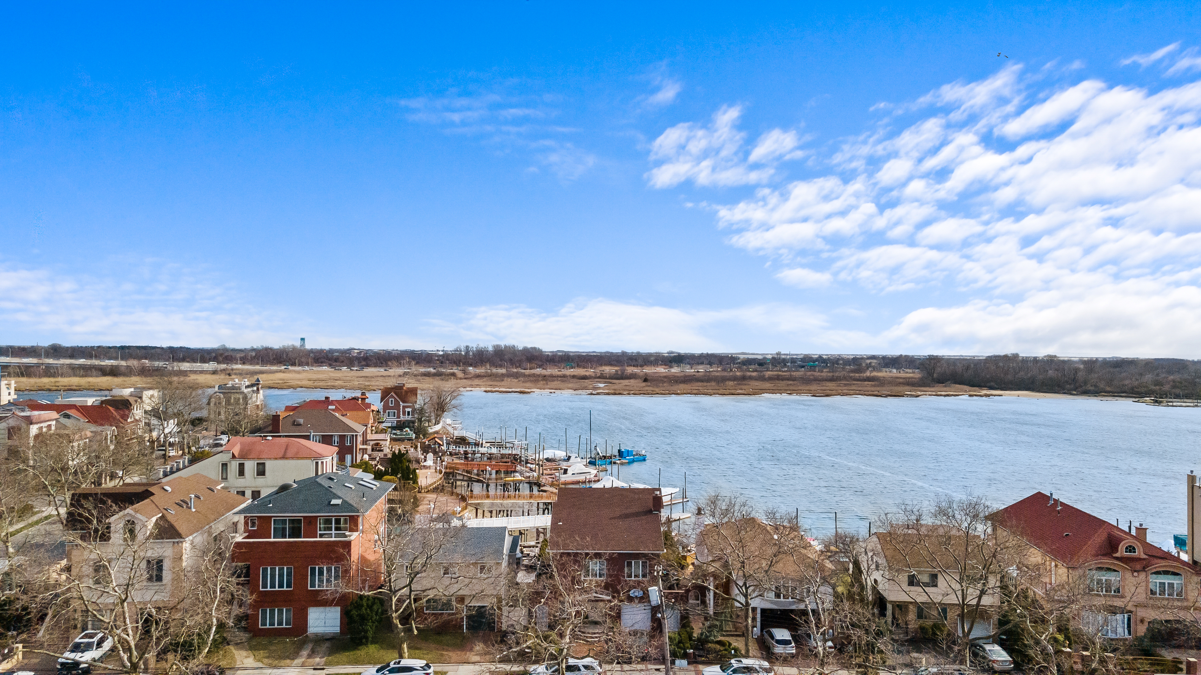 303 Whitman Drive Brooklyn, NY 11234 - Photo 3 of 37 a view of a city with ocean view