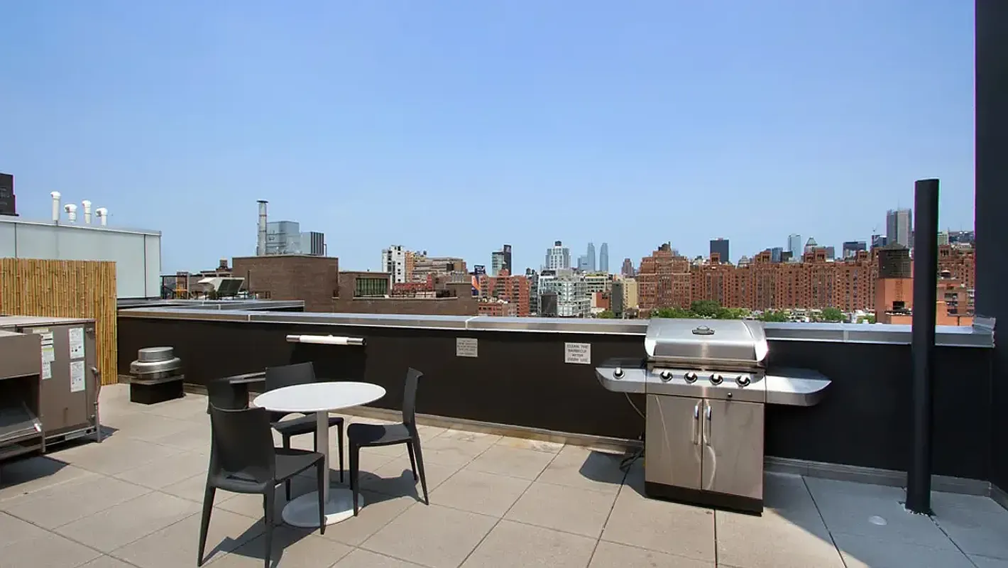 a view of a chairs and table on the terrace