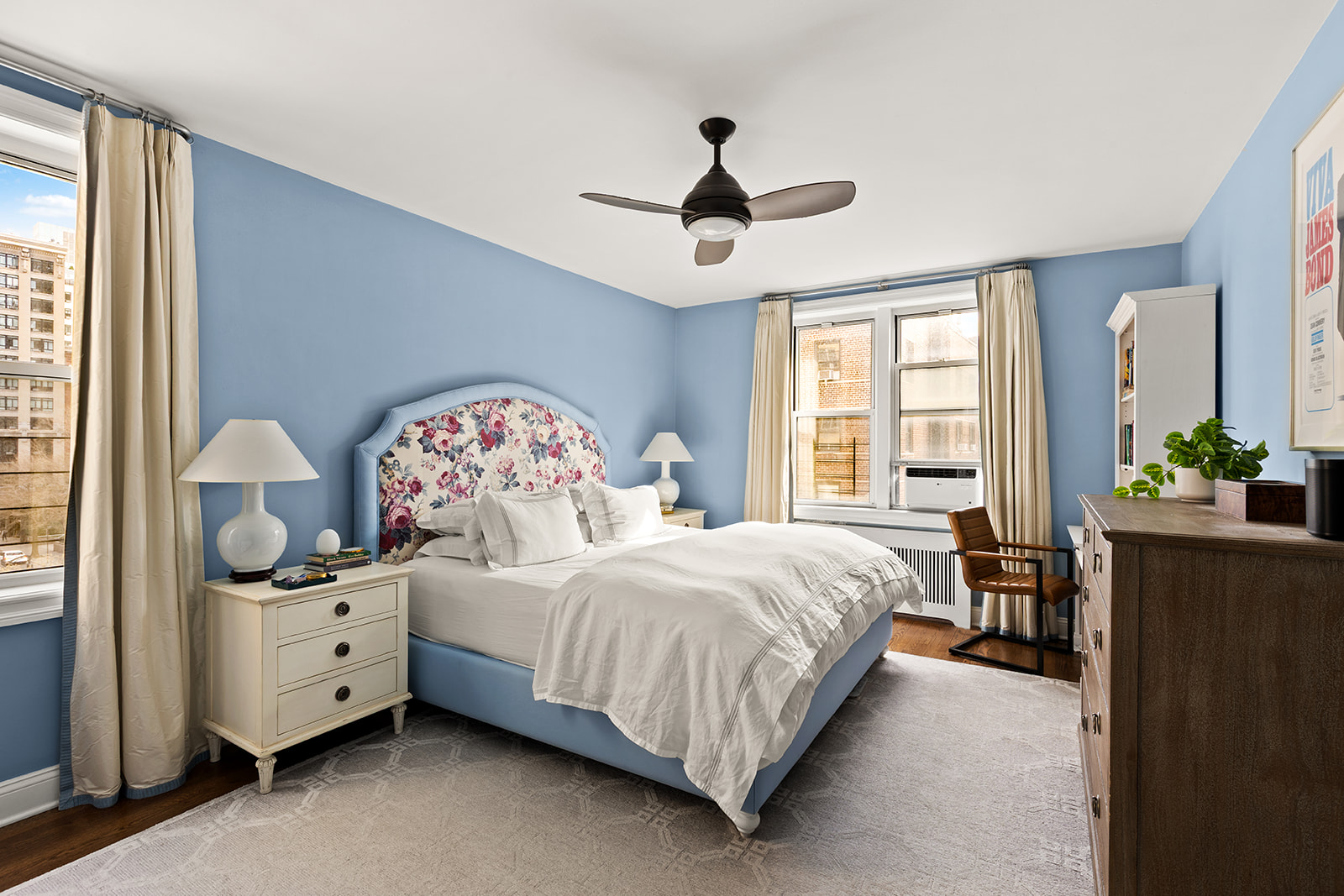 30 East 9th Street, Unit 5LL Manhattan, NY 10003 - Photo 5 of 10 a bedroom with bed and window