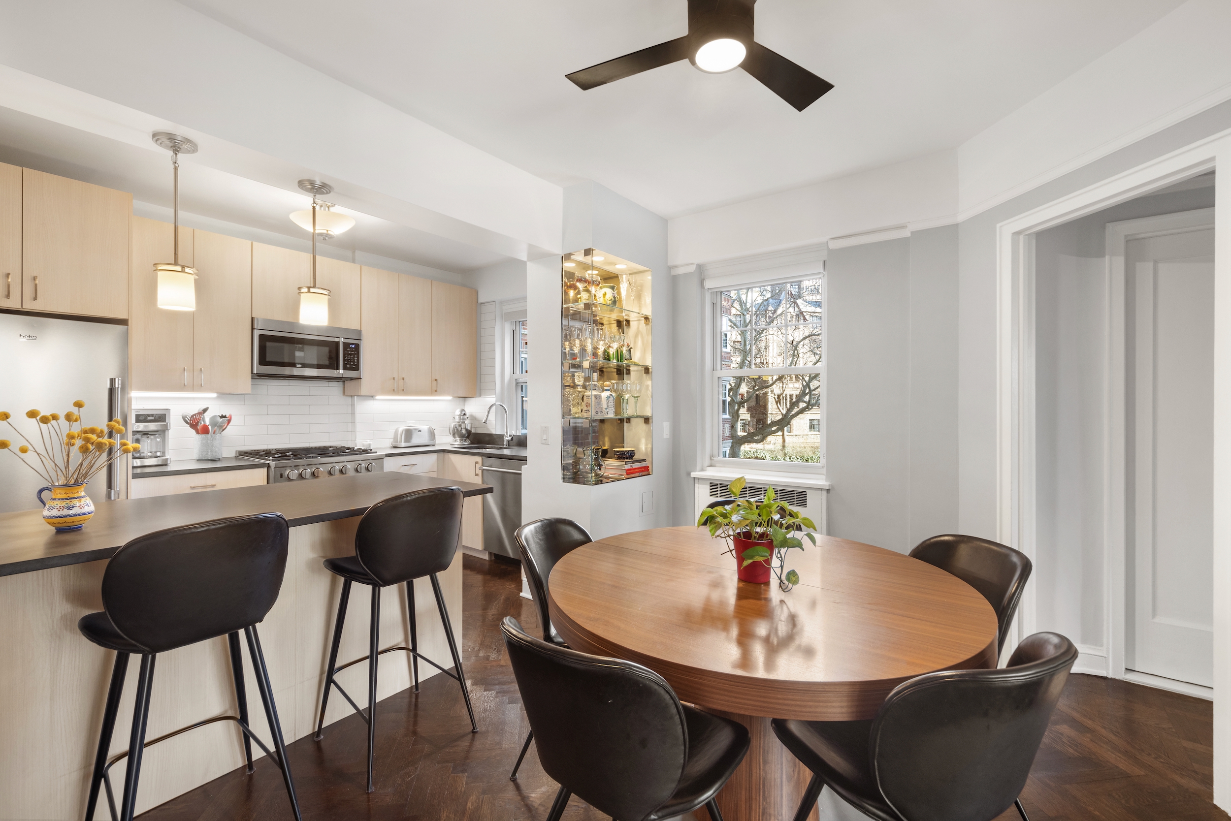 160 Cabrini Boulevard, Unit 22 Manhattan, NY 10033 - Photo 4 of 23 a dining room with furniture and window