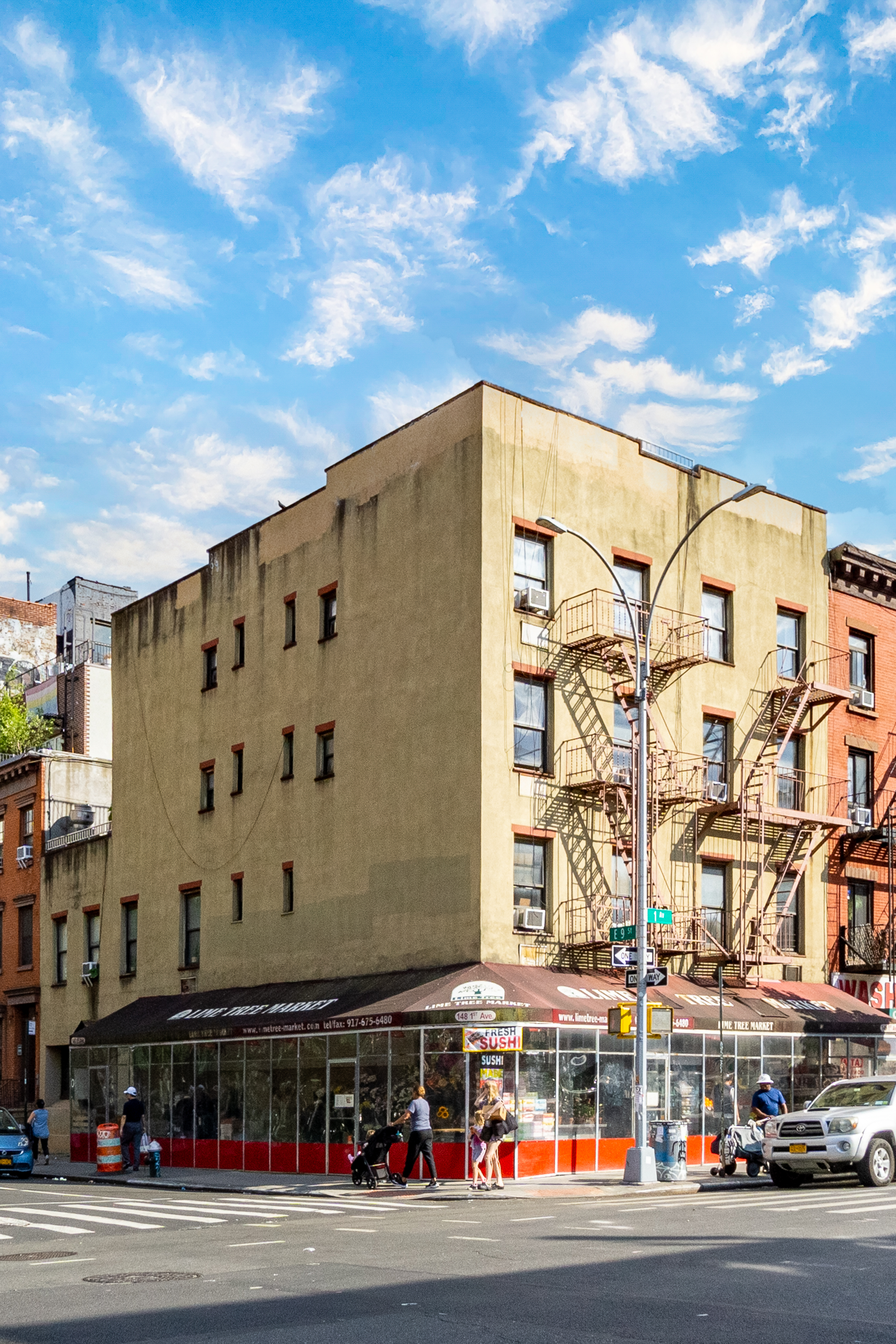 400 East 9th Street, Unit 3B Manhattan, NY 10009 - Photo 6 of 12 a city street with tall buildings in the background