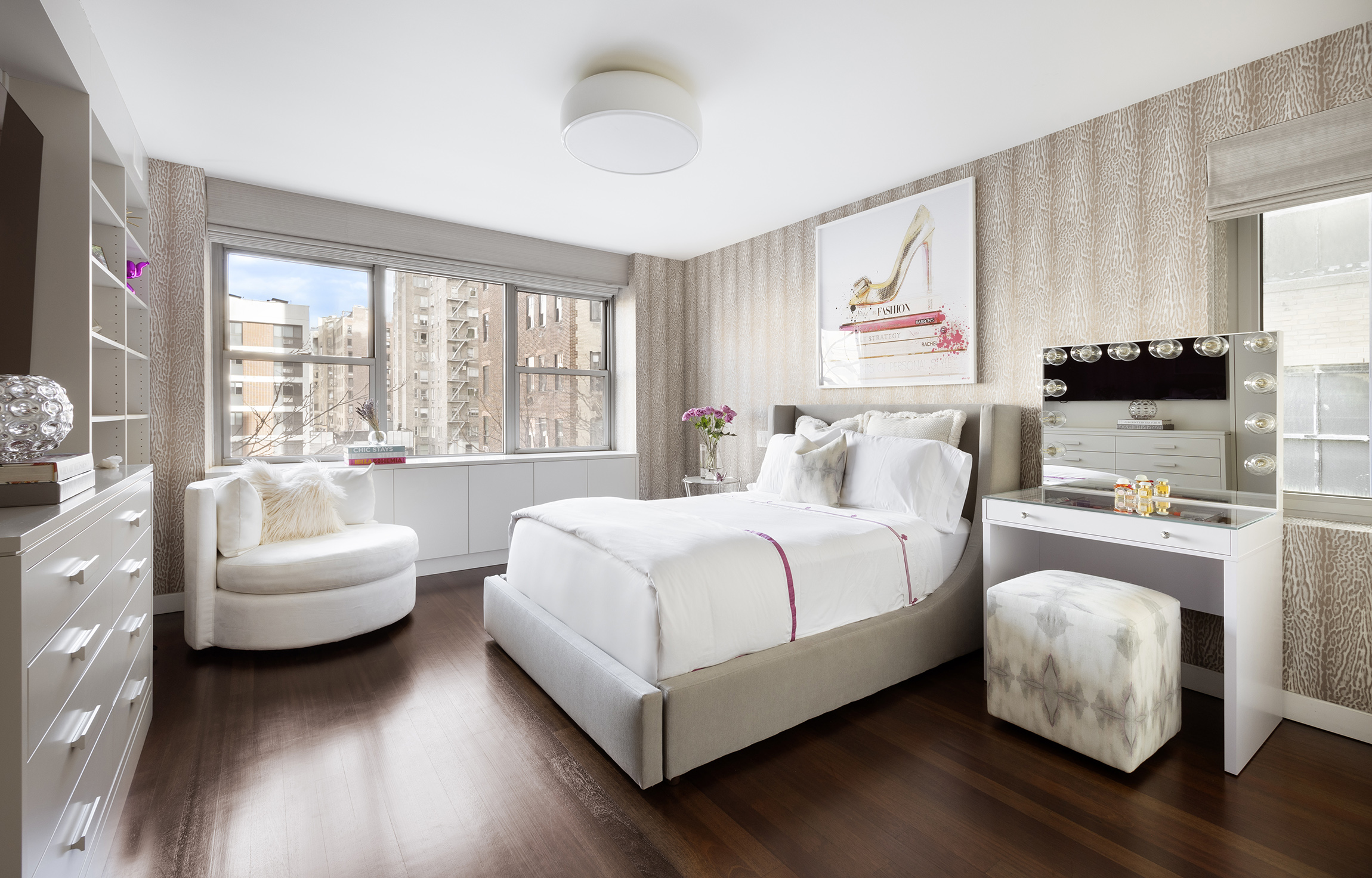 45 East 72nd Street, Unit 9BC Manhattan, NY 10021 - Photo 10 of 16 a bedroom with a bed couch and a large window