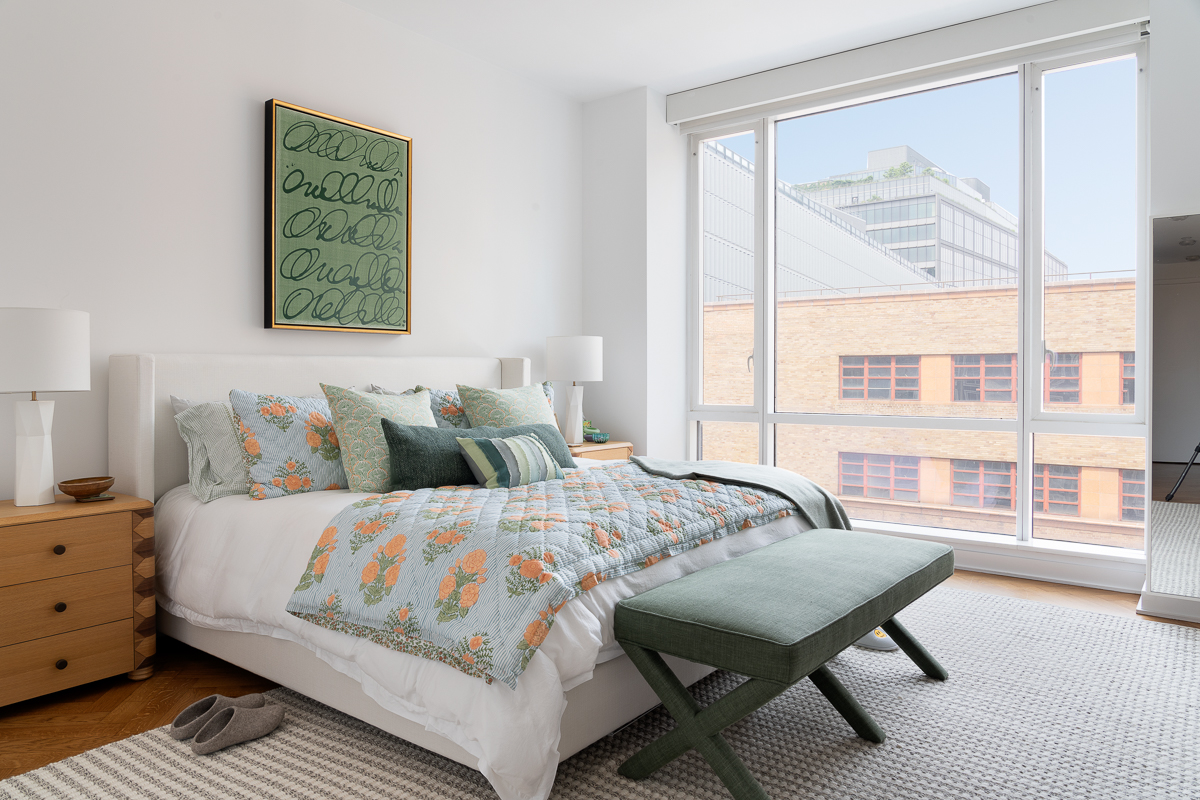 330 Spring Street, Unit 5A Manhattan, NY 10013 - Photo 7 of 13 a bedroom with a bed and a large window