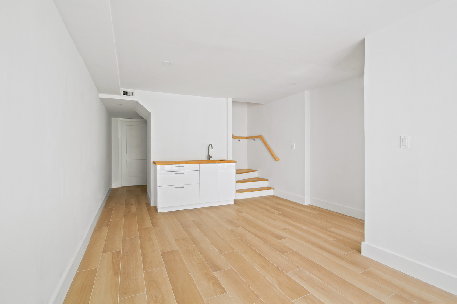 277 Greene Avenue, Unit B Brooklyn, NY 11238 - Photo 6 of 13 a view of a room with wooden floor