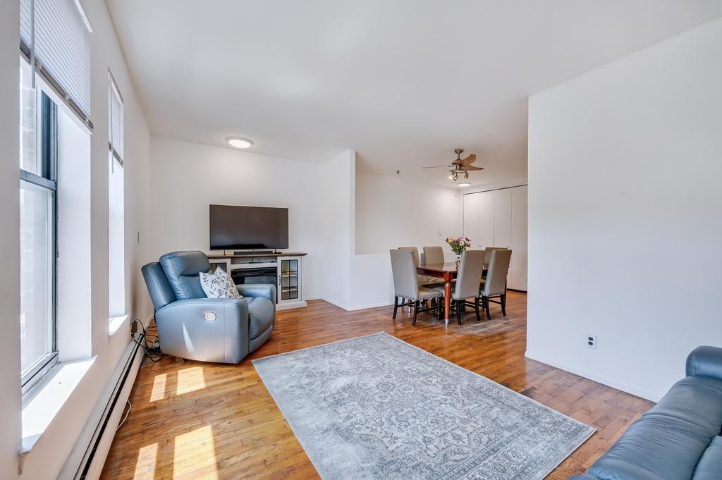 57 Carroll Street, Unit 38A Brooklyn, NY 11231 - Photo 10 of 21 a living room with furniture and a rug