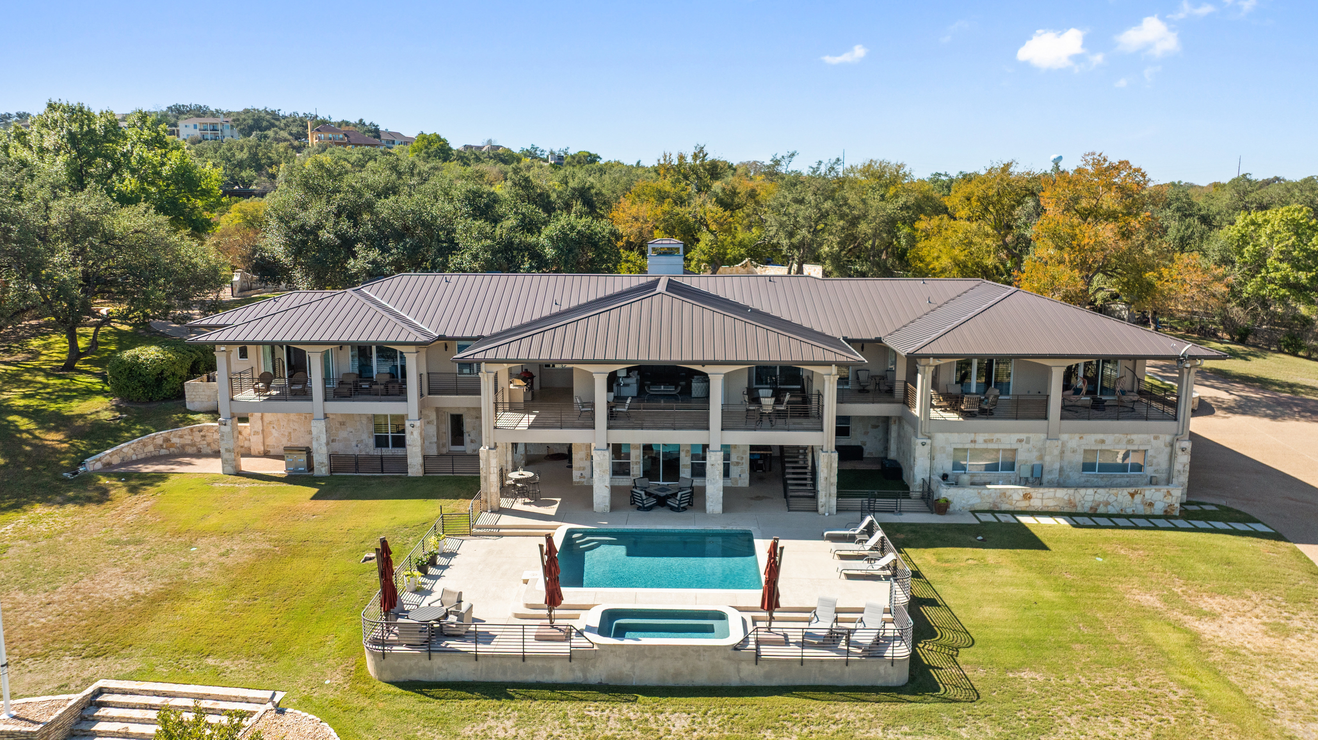 15210 Rainbow 1 Street Austin, TX 78734 - Photo 26 of 138 a front view of a house with swimming pool