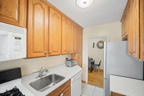 a utility room with a sink a washer and dryer